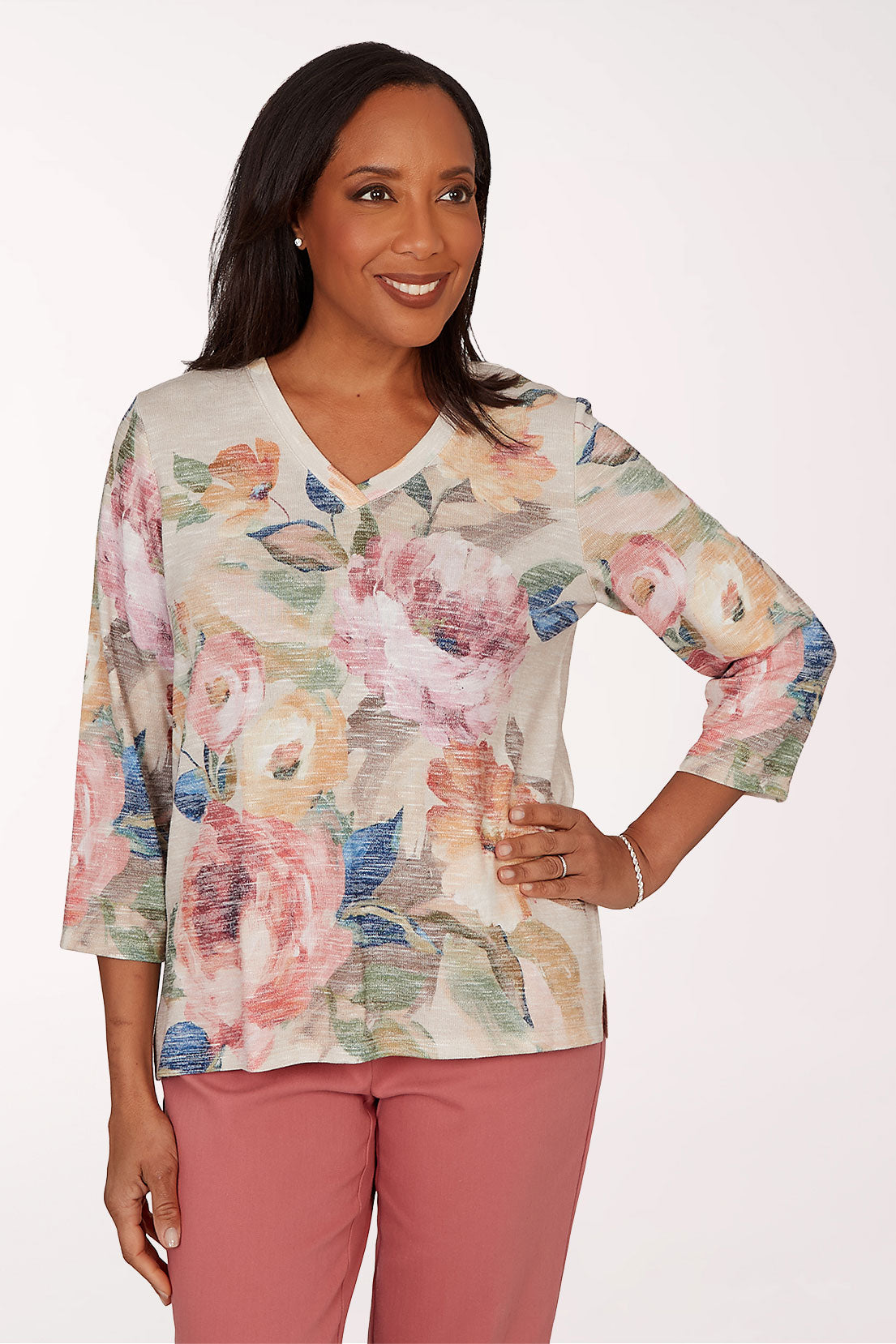 Woman wearing a floral 3/4 sleeve top