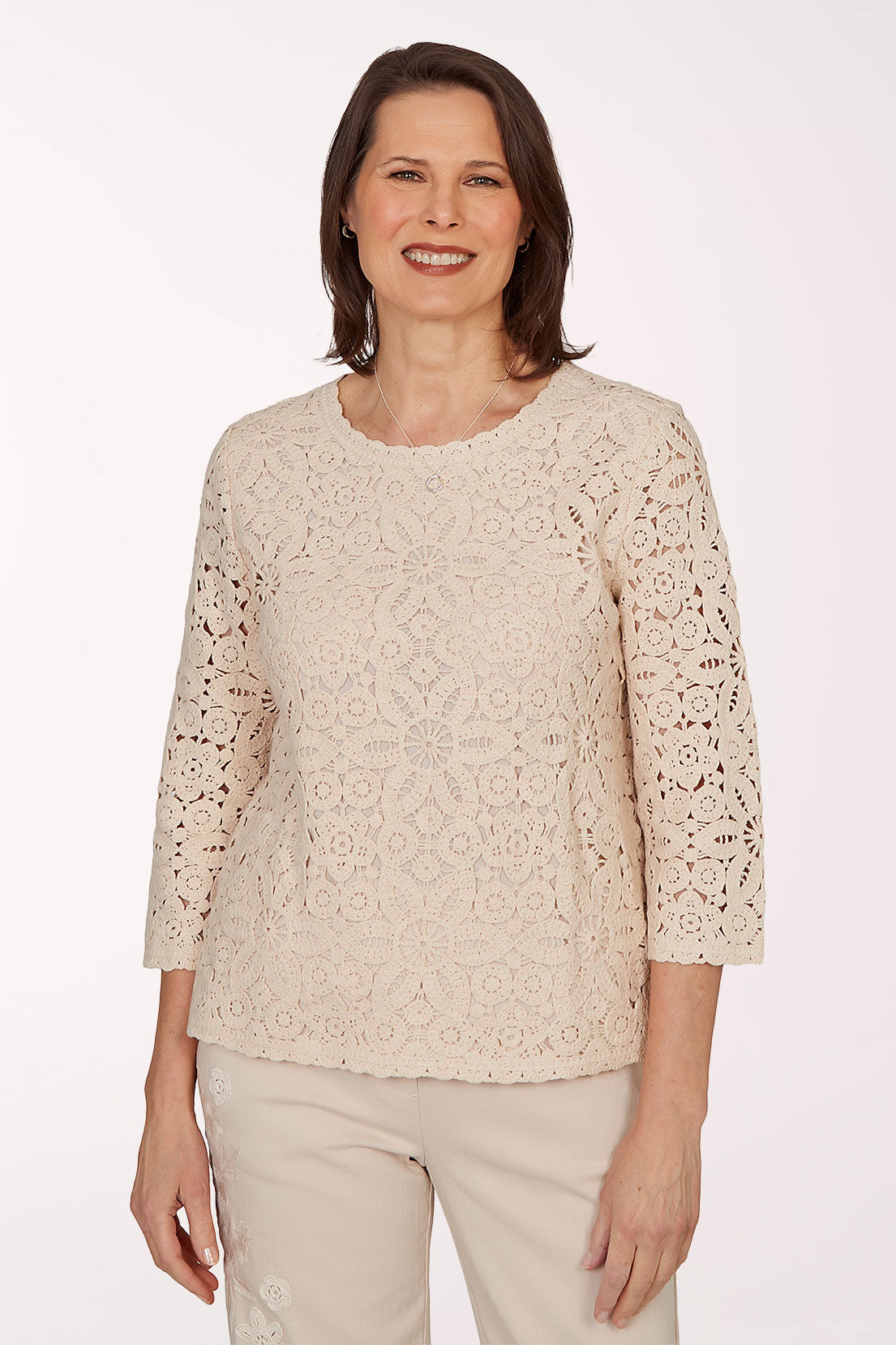 Woman wearing a beige crop top