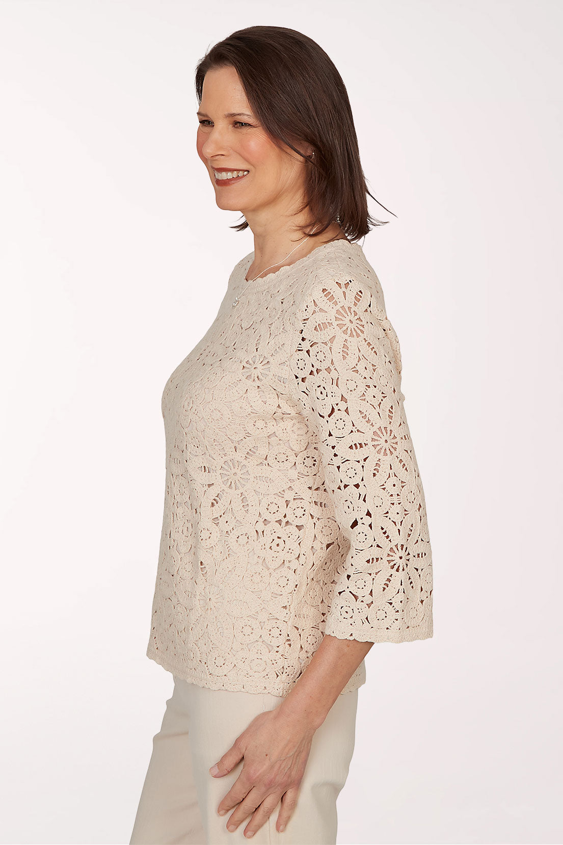 Woman wearing a beige crop top