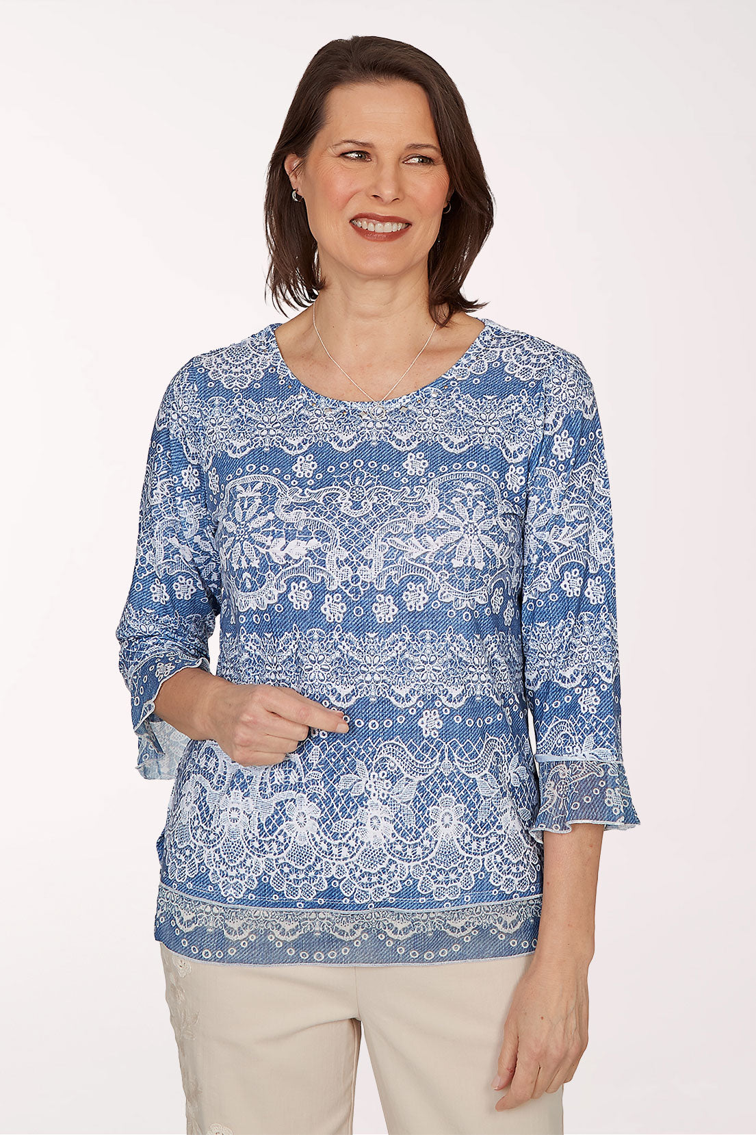 Woman wearing a blue multi 3/4 sleeve top