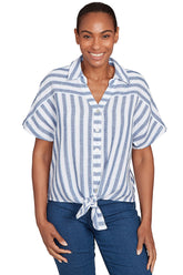 A front shot of a model wearing a blue and white striped shirt with a tie waist, standing against a white background.