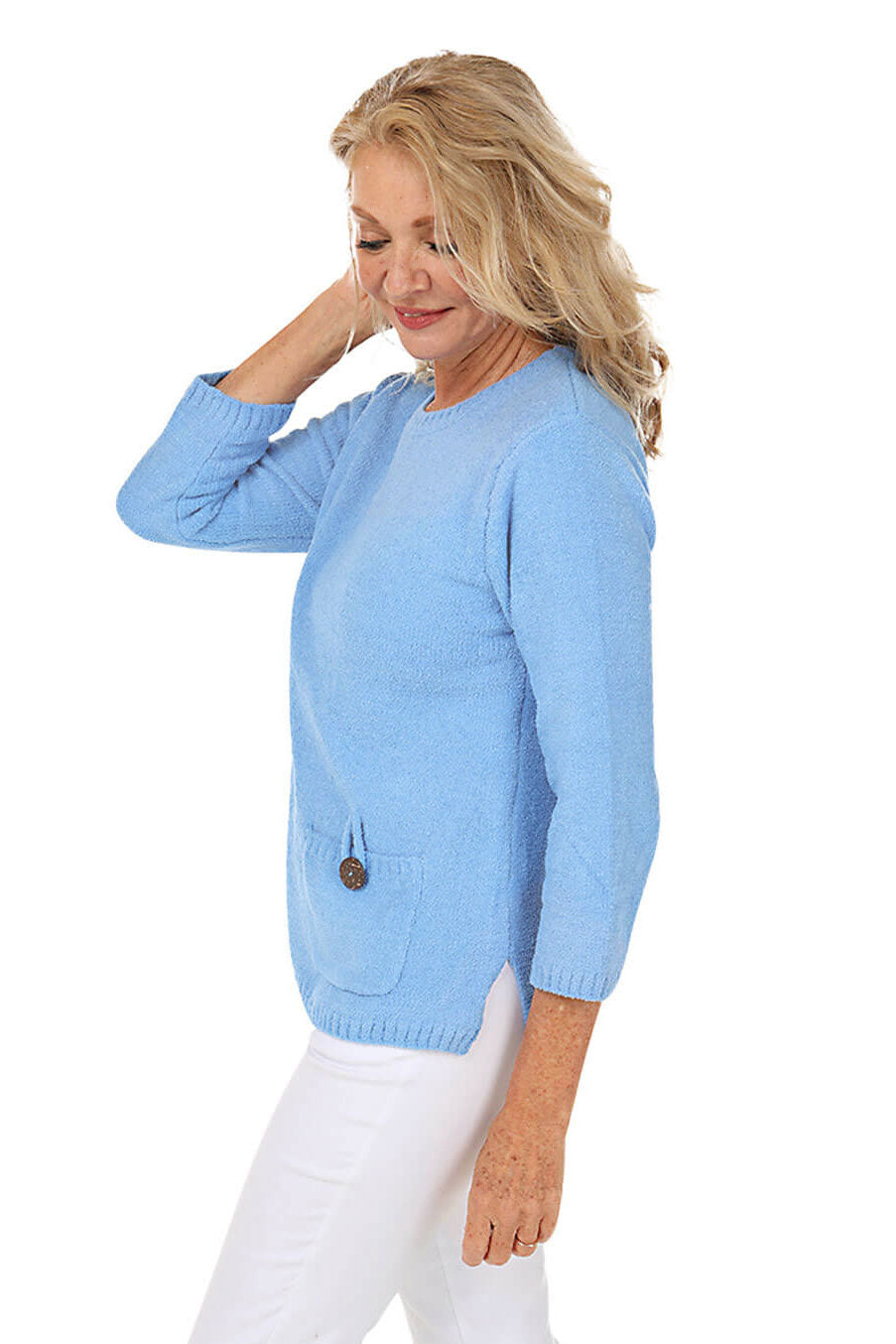 Side shot of a model wearing a periwinkle sweater.