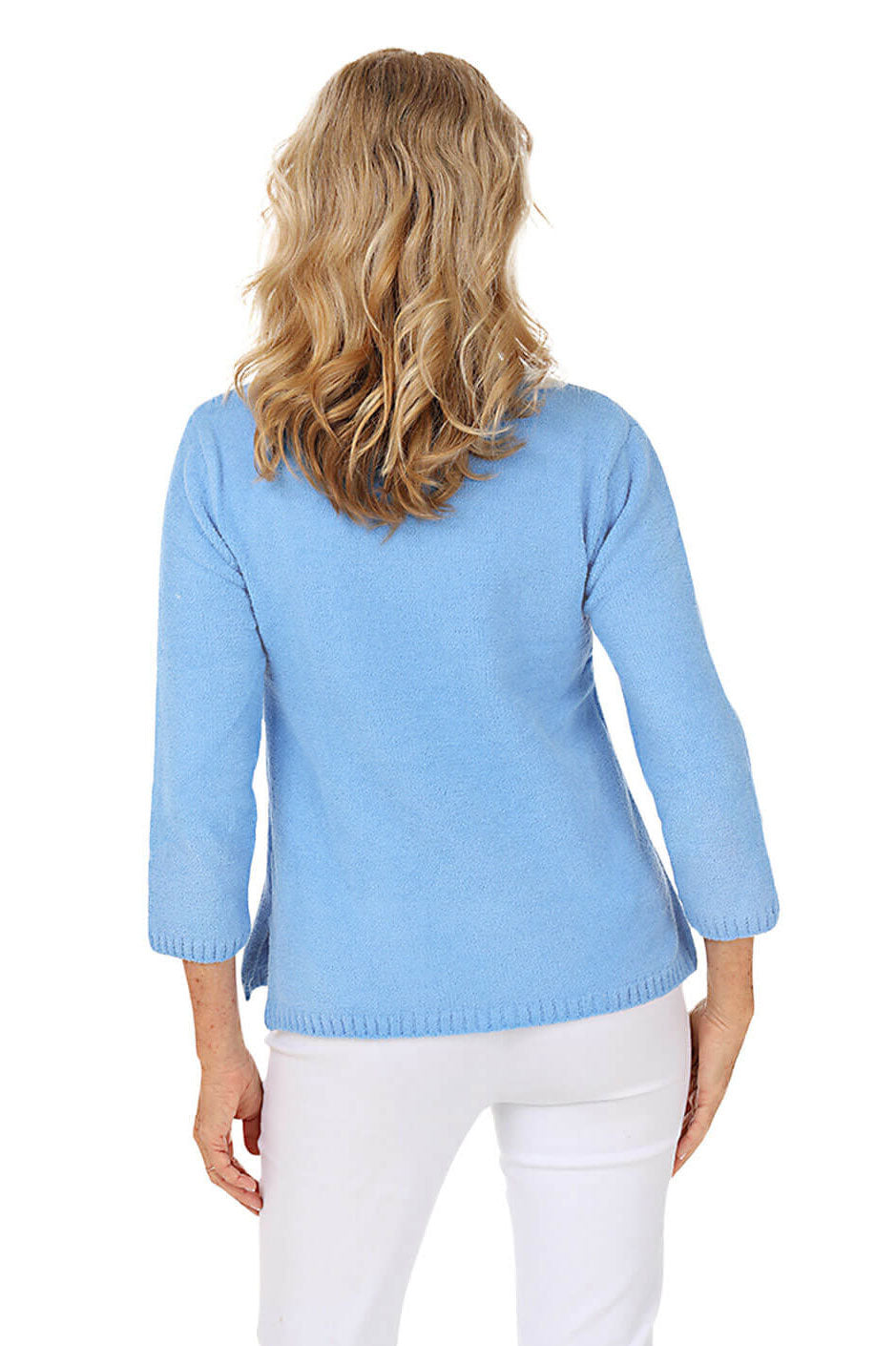 Back shot of a model wearing a periwinkle sweater.