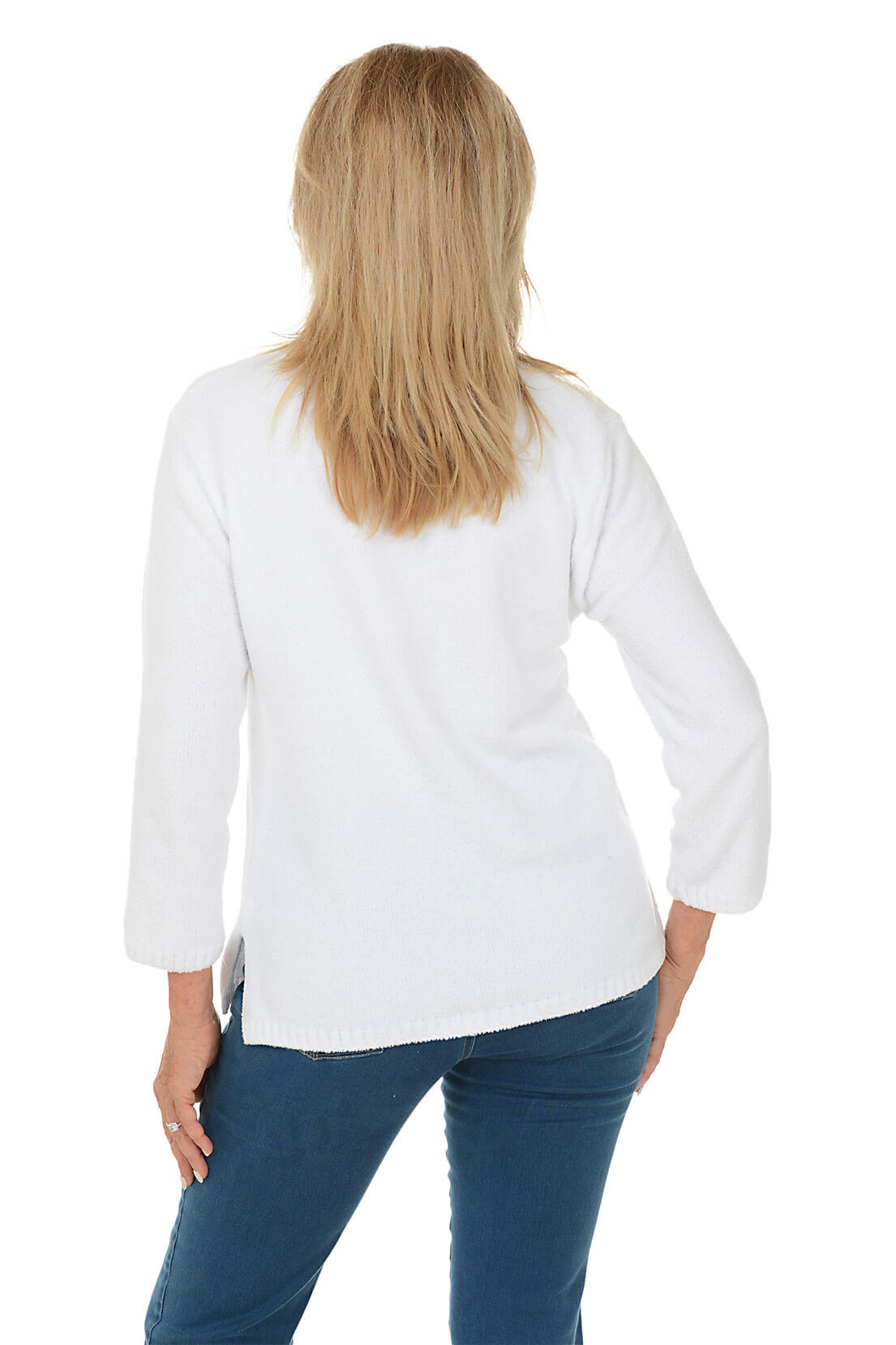 Back shot of person wearing a white long-sleeve shirt and blue jeans on a white background