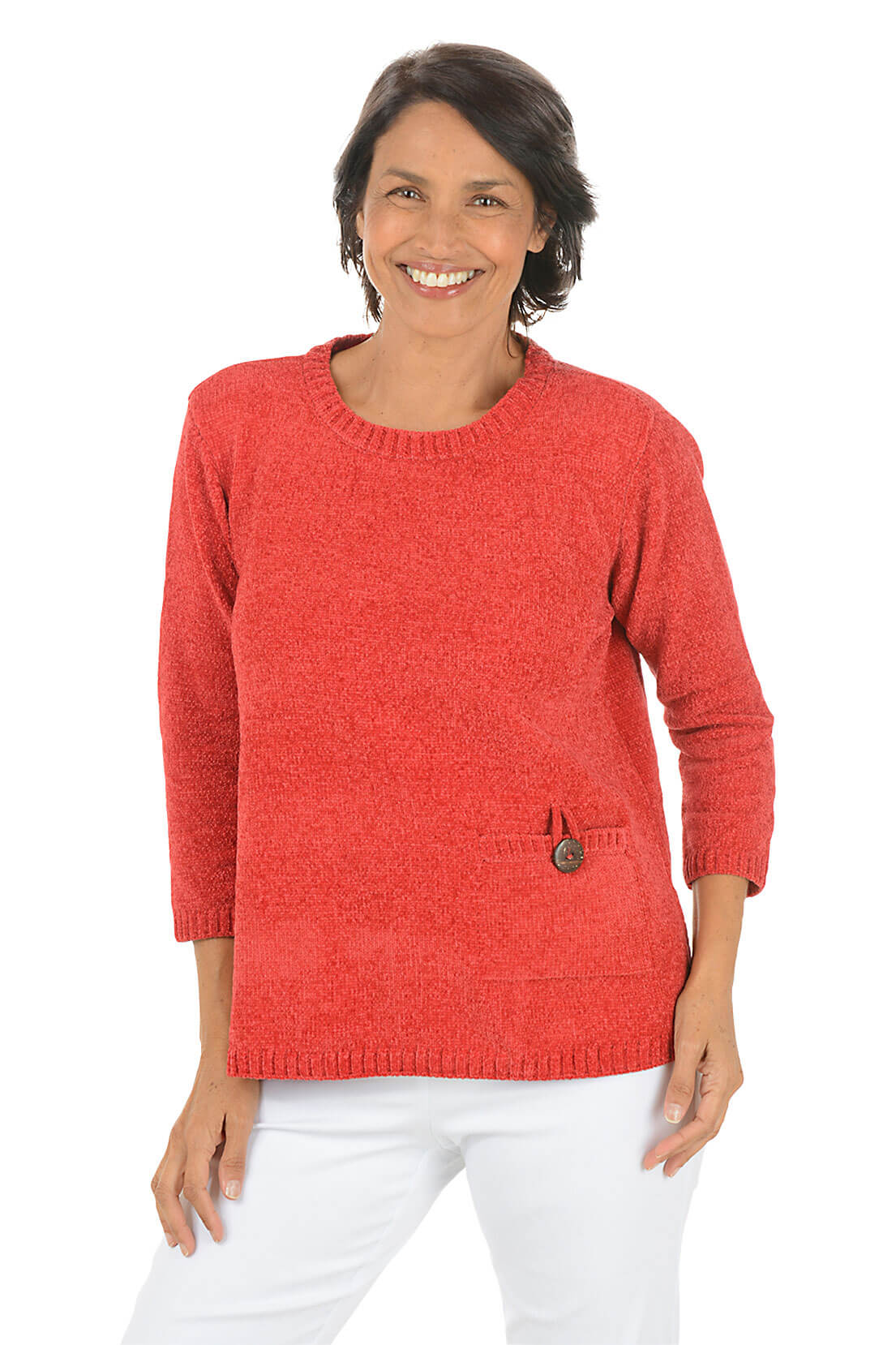 Woman wearing a red sweater with a pocket on a white background