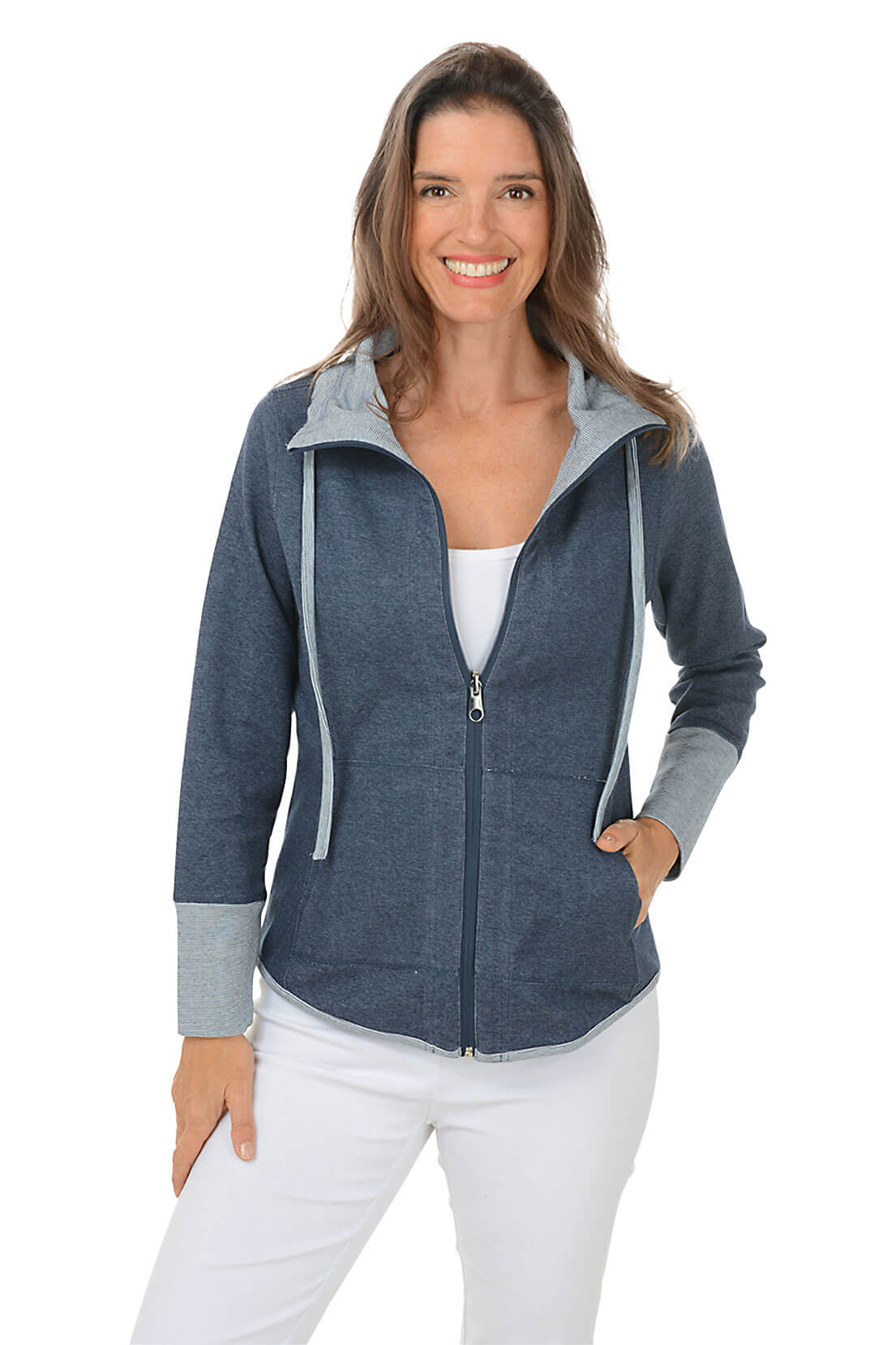 Woman wearing a blue zip-up hoodie with a white background
