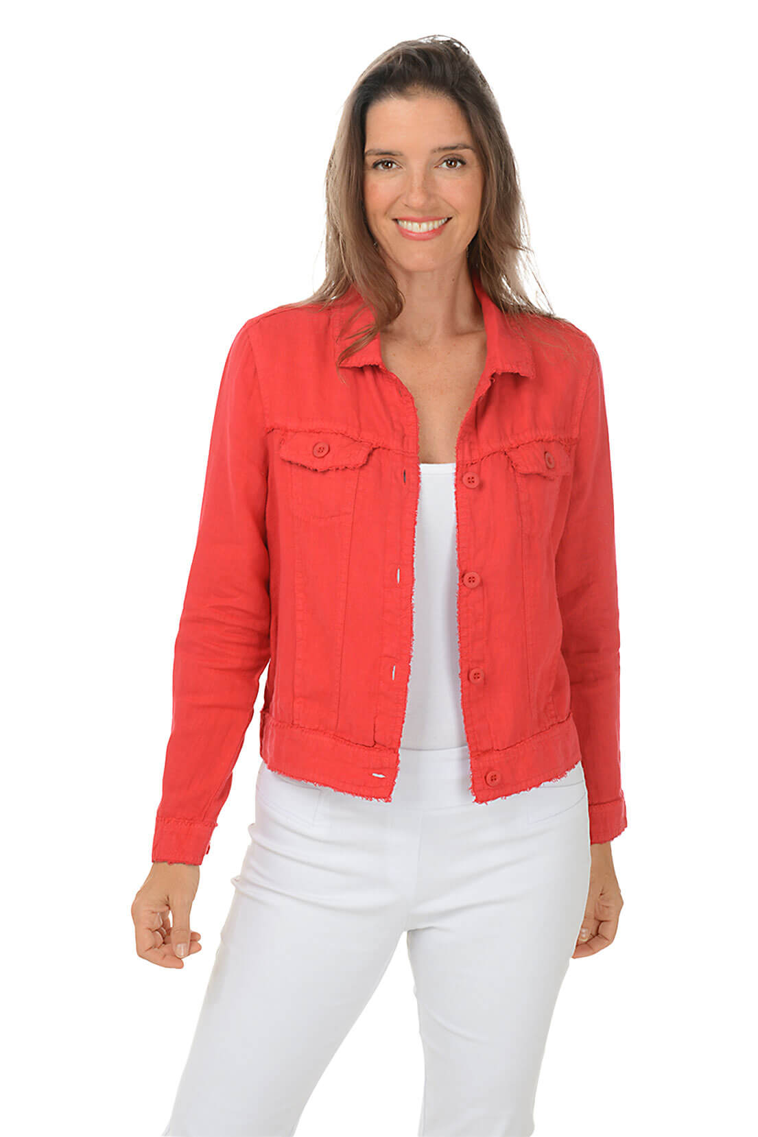 Woman wearing a red jacket and white pants on a white background