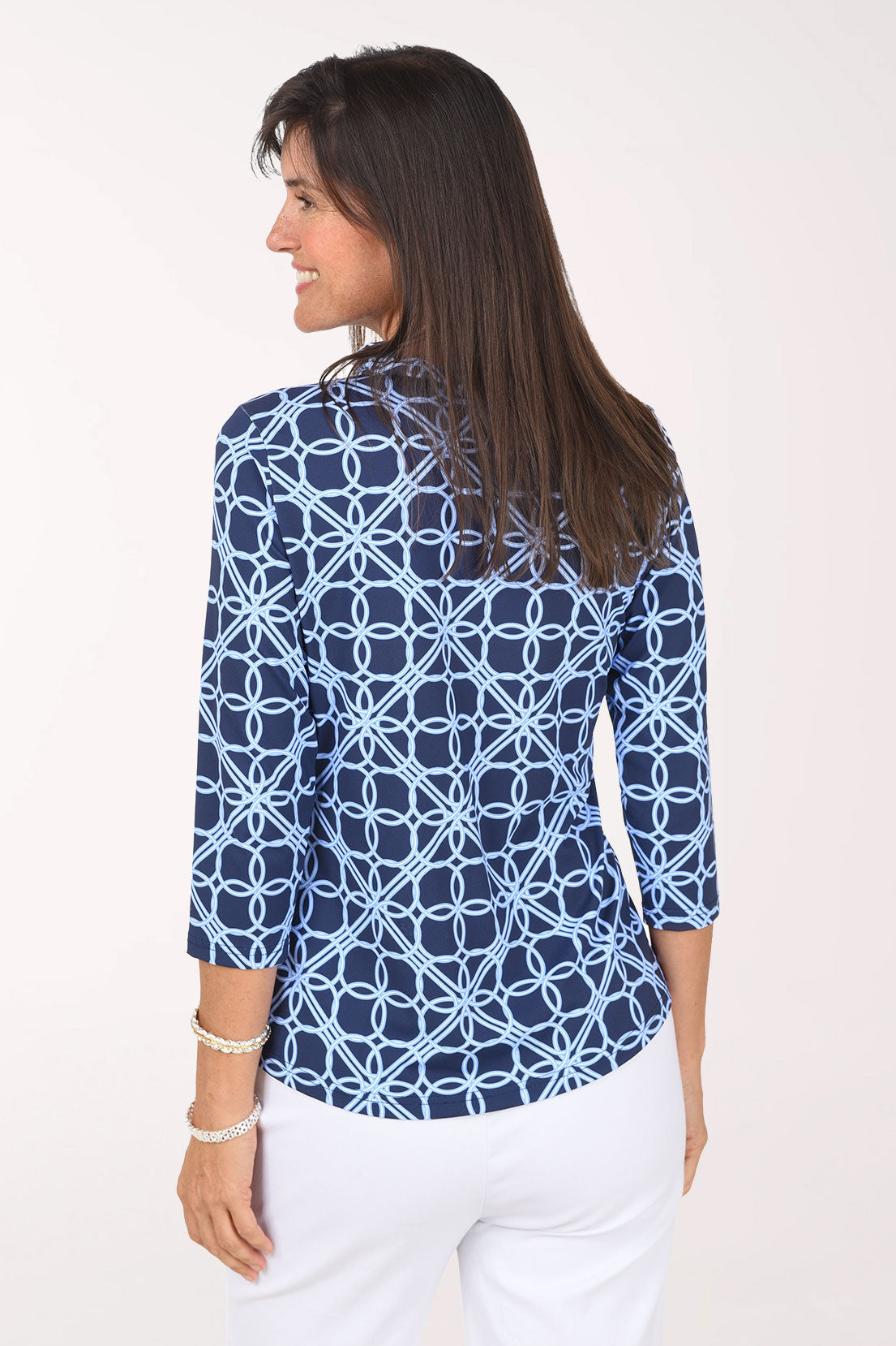 Back view of the Blue Lattice Rings Ruffle Neck Top showing the all-over lattice print and straight hem.