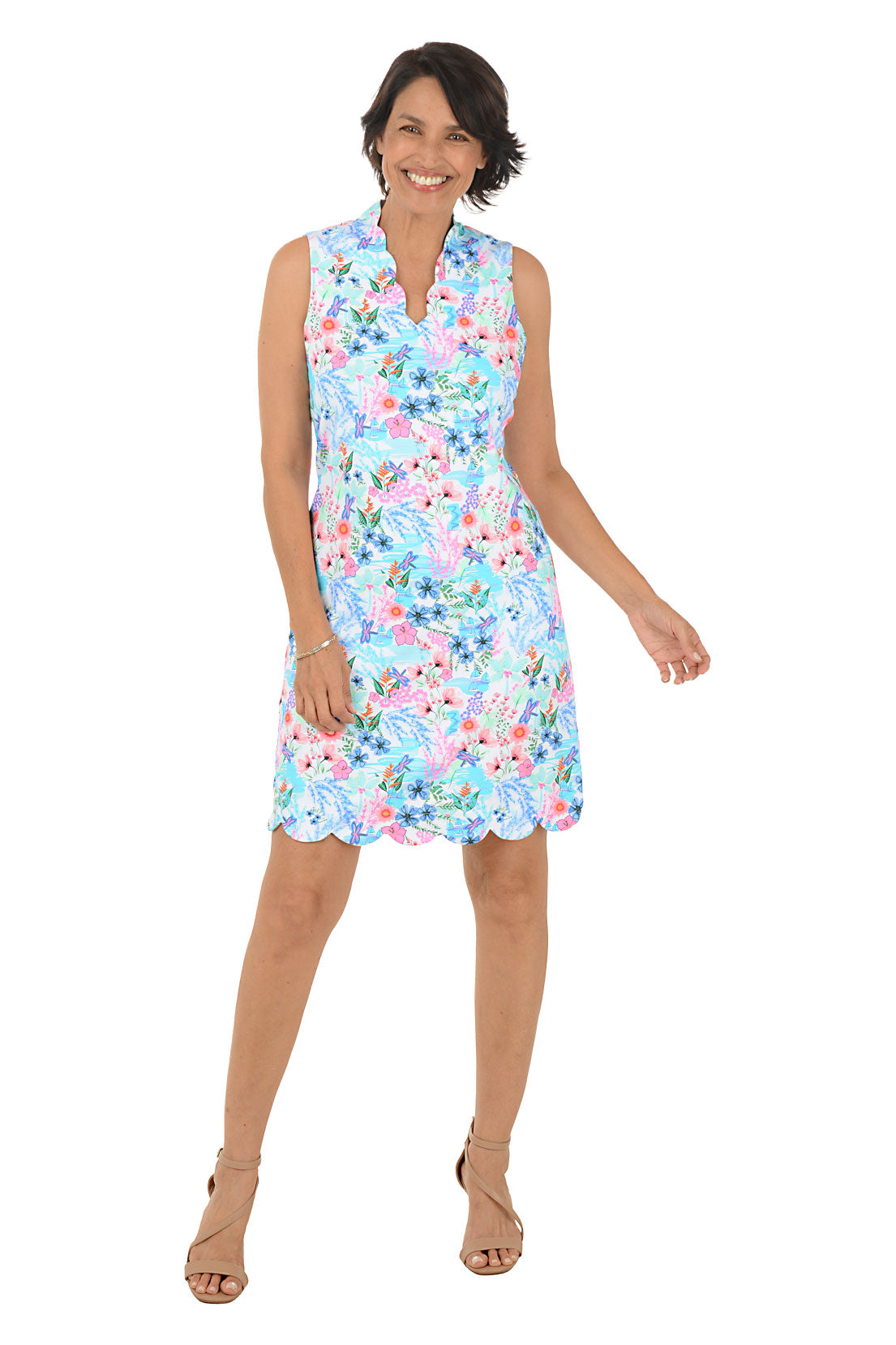 Woman wearing a floral dress on a white background