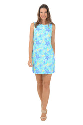 A sleeveless shift dress with a scoop neckline and straight hemline, featuring a blue and yellow starfish pattern.