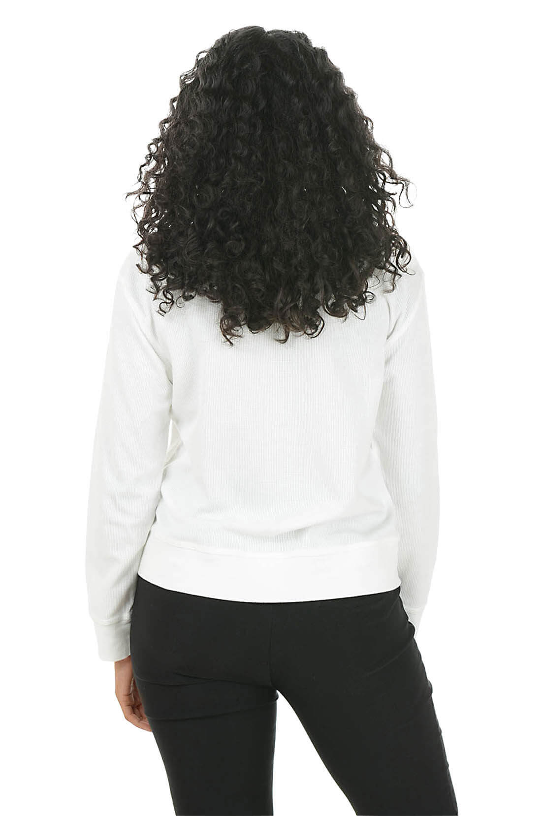Woman wearing a white jacket on a white background. Back shot.