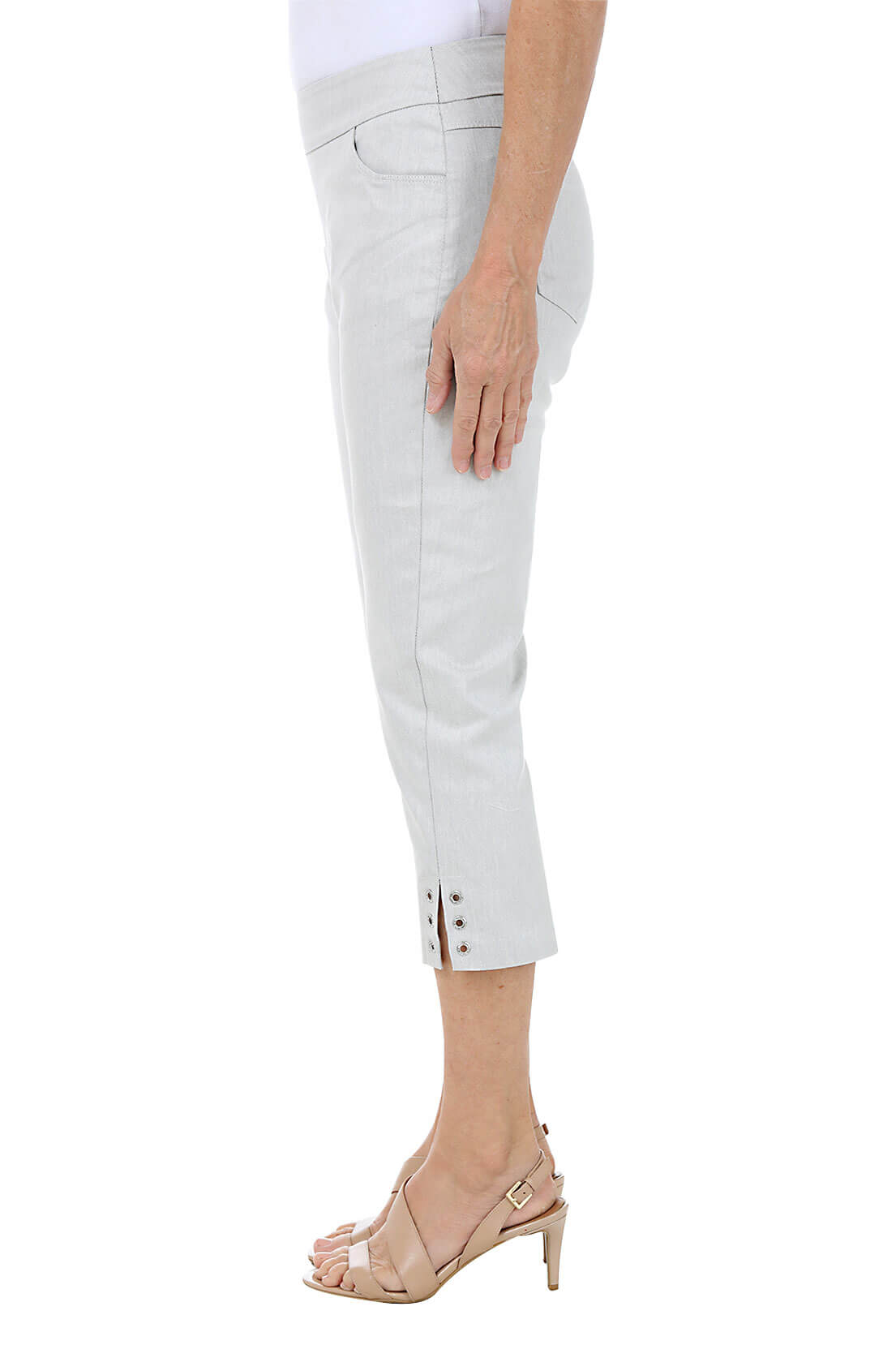 A pair of silver denim capri pants with rhinestone embellishments on the hemline, featuring a classic five-pocket design. Side shot.