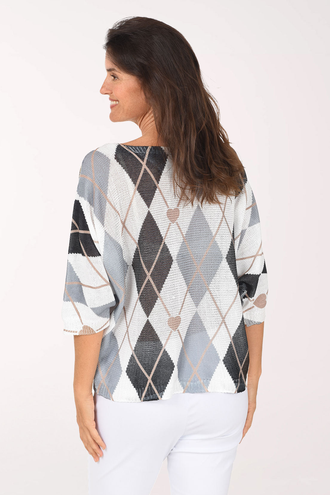 Back view of the sweater with charcoal, grey and white diamonds, blush hearts and gold outlines