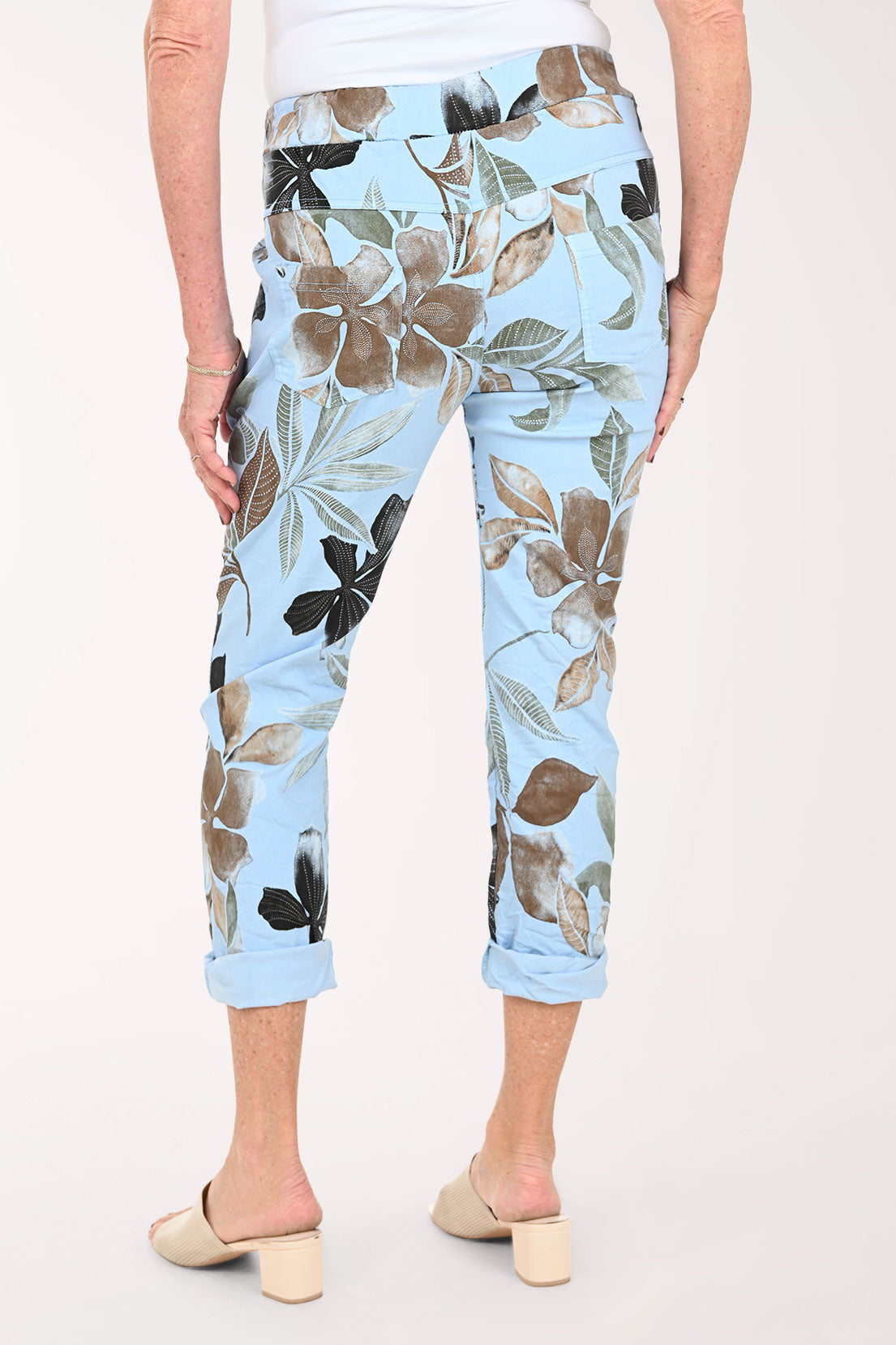 Woman wearing blue floral jogger pants