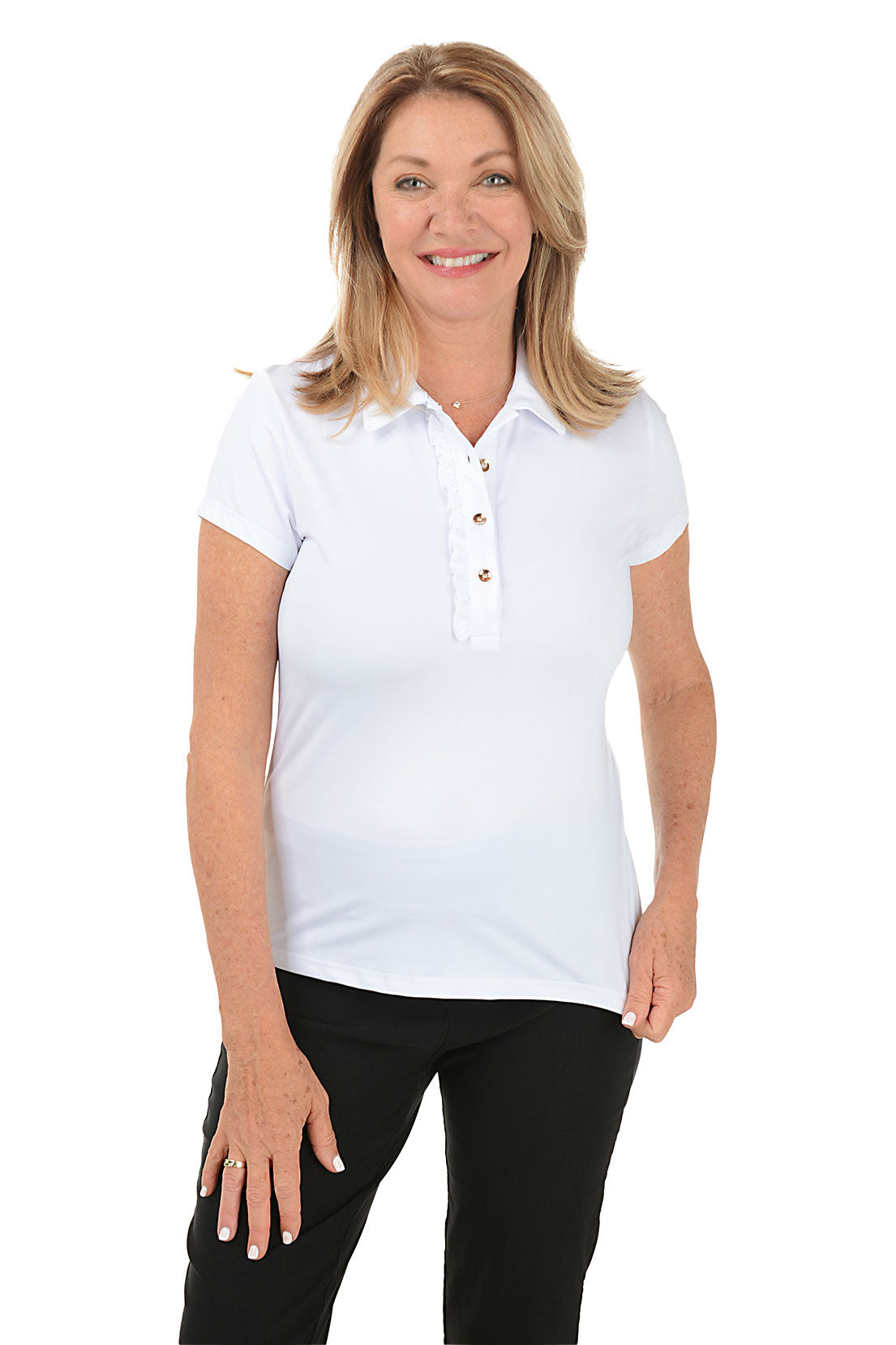 A woman wearing a white short sleeve polo top with a foldover collar and buttoned half placket, paired with black pants.