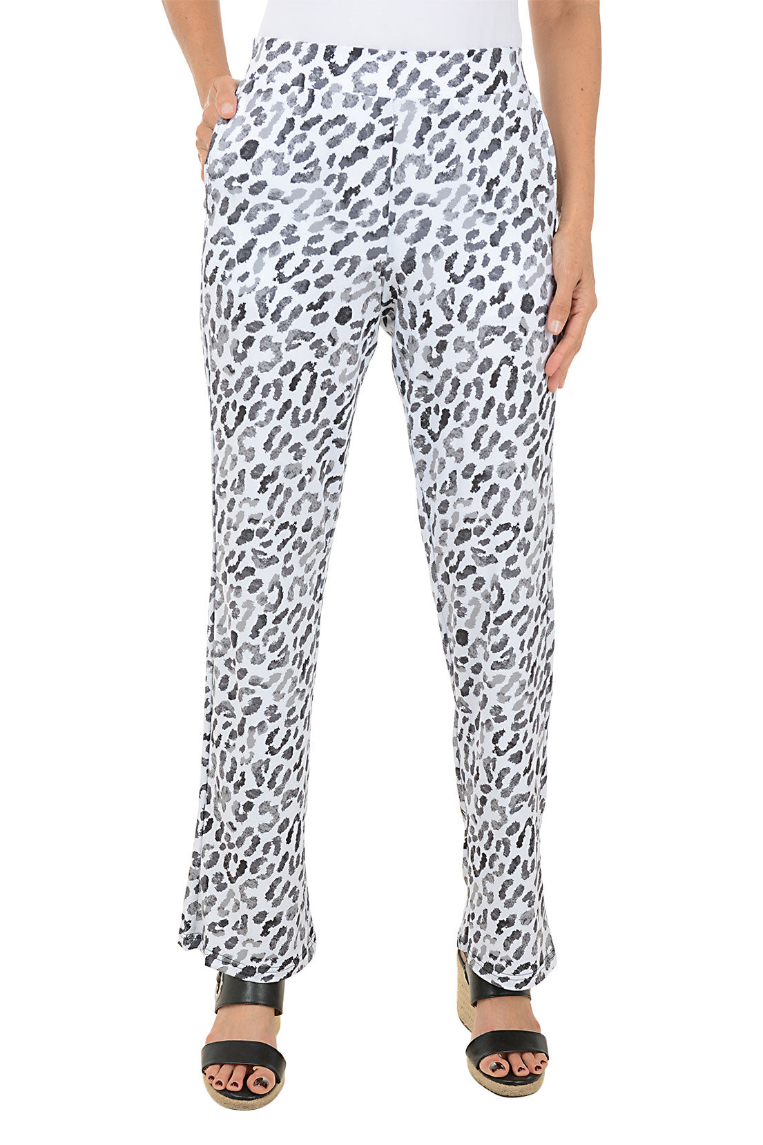 A pair of flared pull-on pants with a white and animal print, featuring a 2-inch elasticized waistband and dual front pockets.
