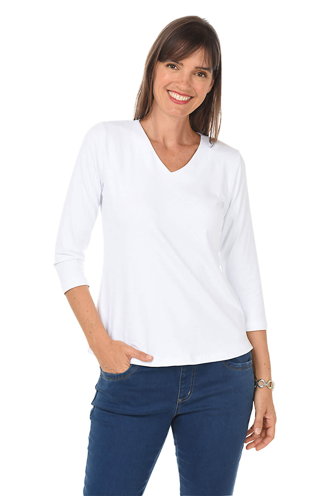 Woman wearing a white long-sleeve top and blue jeans on a white background