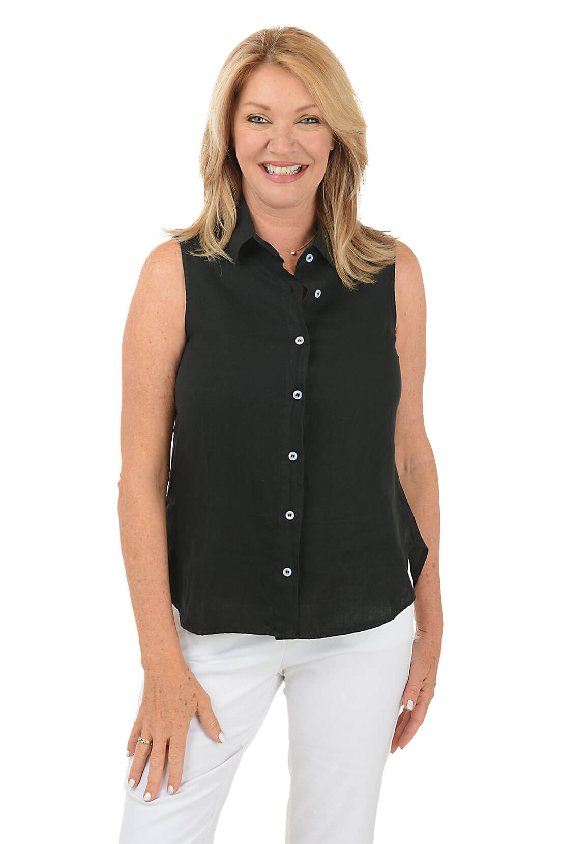 A woman wearing a sleeveless black linen button-front shirt with a classic foldover collar.