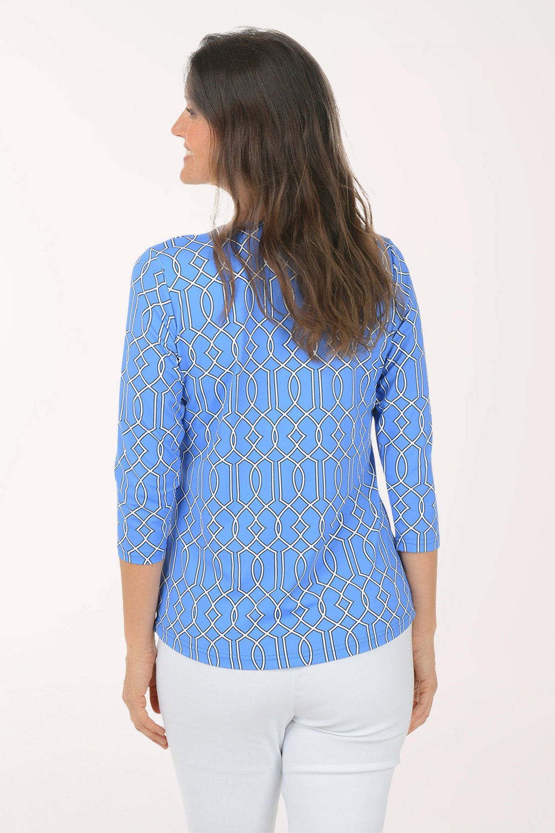A woman wearing a 3/4 sleeve blue top.