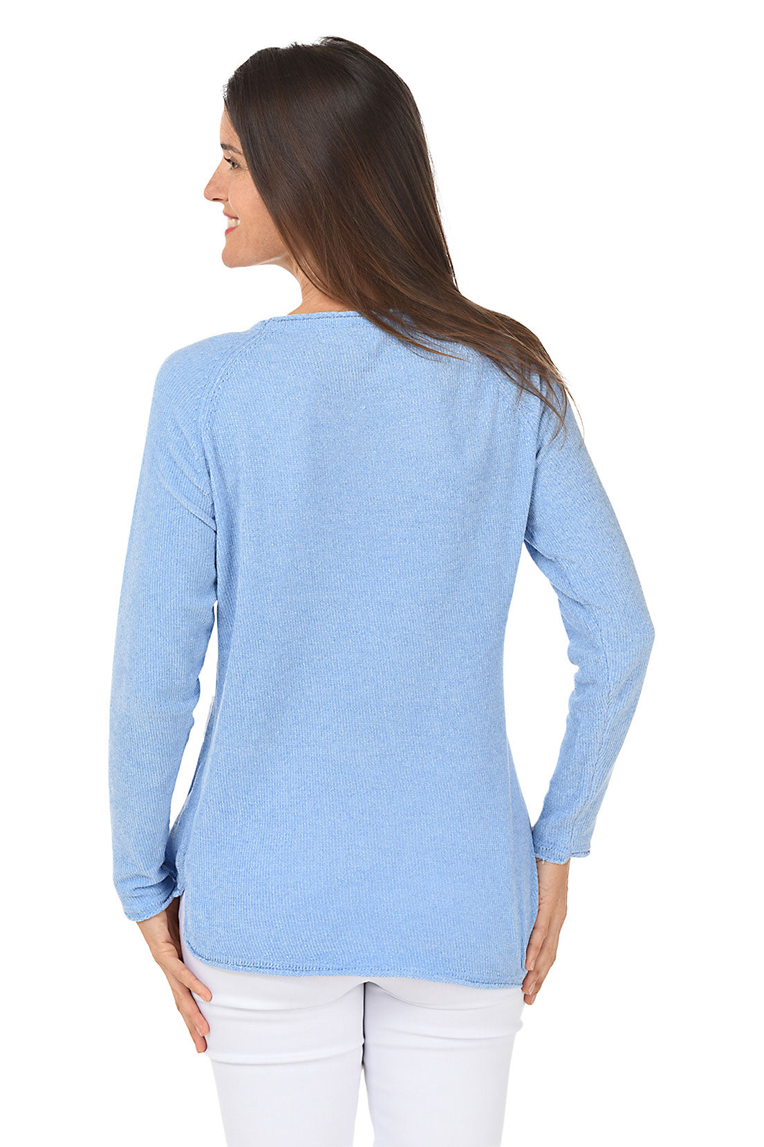 A woman wearing a chenille periwinkle sweater with the words "Chillin" across the chest. Back shot.