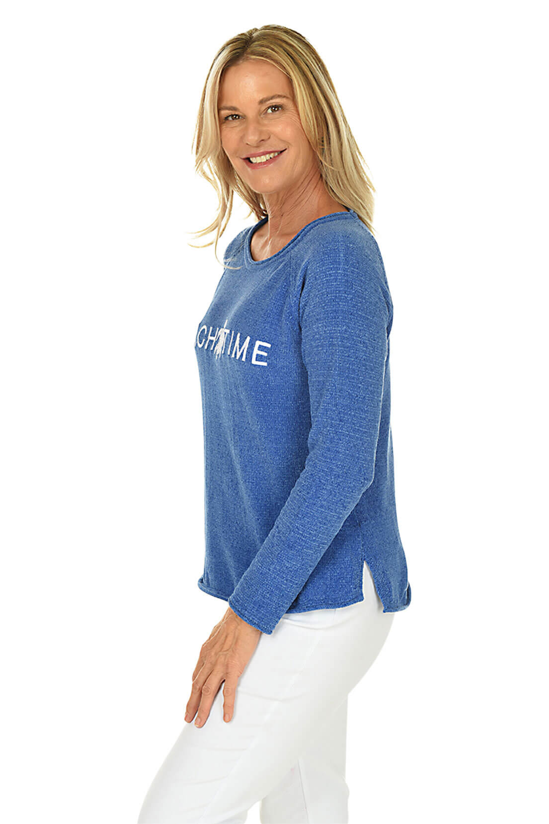 Woman wearing a blue long-sleeve shirt with text on a white background