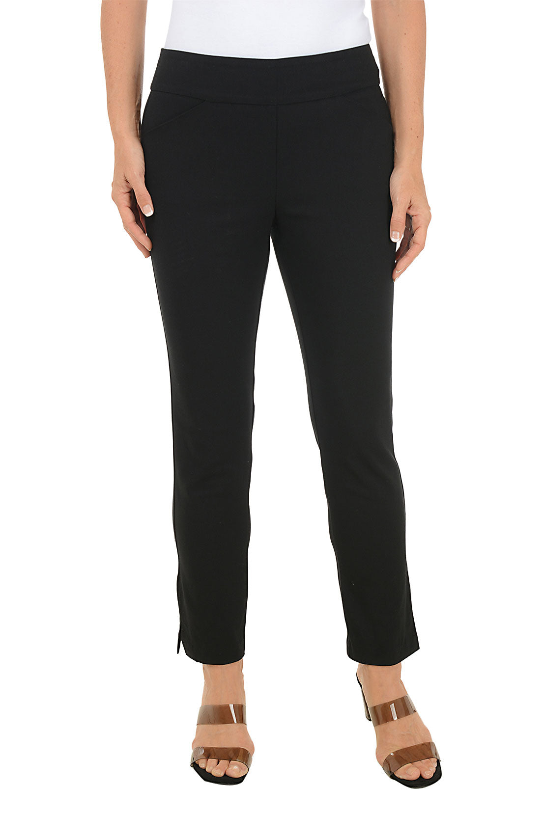 Person wearing black pants on a white background.