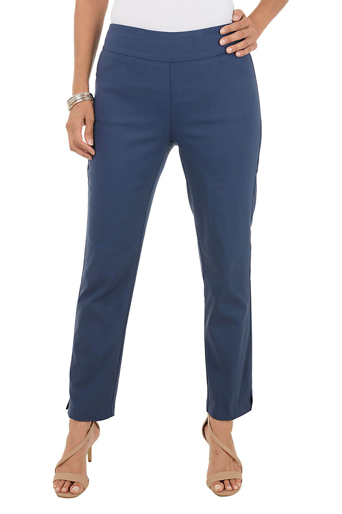 Blue pants worn by a person on a white background
