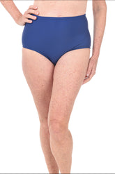 Person wearing navy high-waisted swim bottoms on a white background.