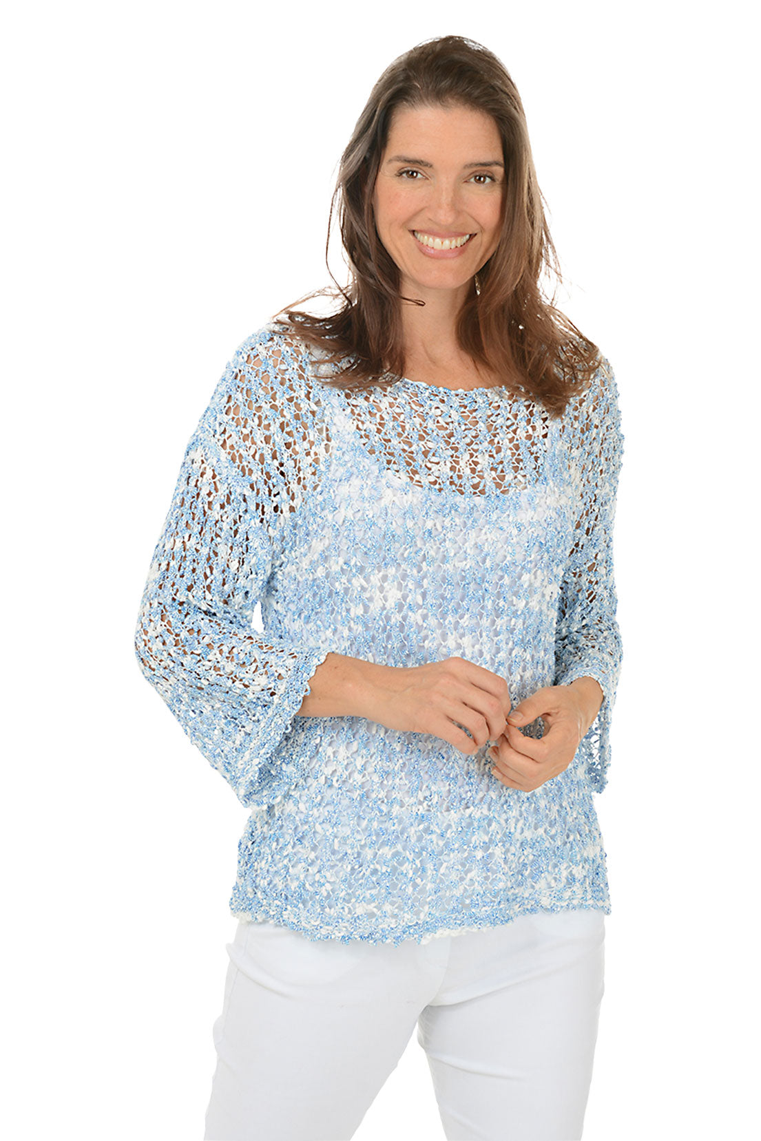 A woman wearing a blue open weave design crewneck sweater with 3/4-length dolman bell sleeves and drop shoulders.