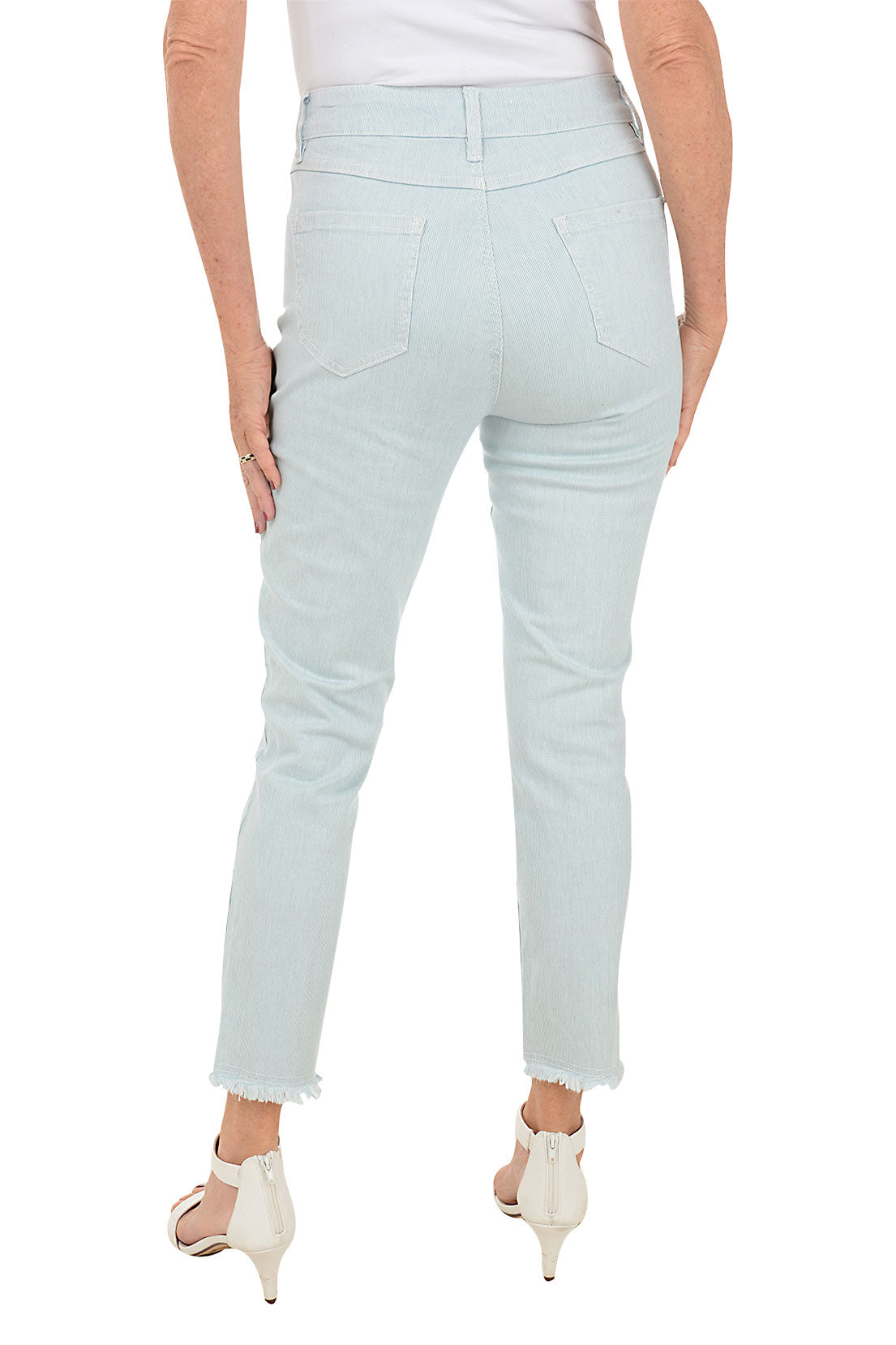 A pair of light blue, frayed hem ankle pants with a mid-rise waist and 5-pocket design. Back shot.