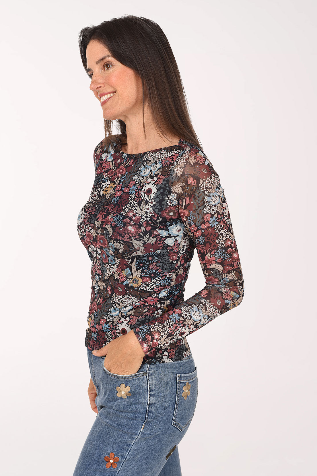 Side view of the Azalea Floral Mesh Long Sleeve Top with semi-sheer long sleeves