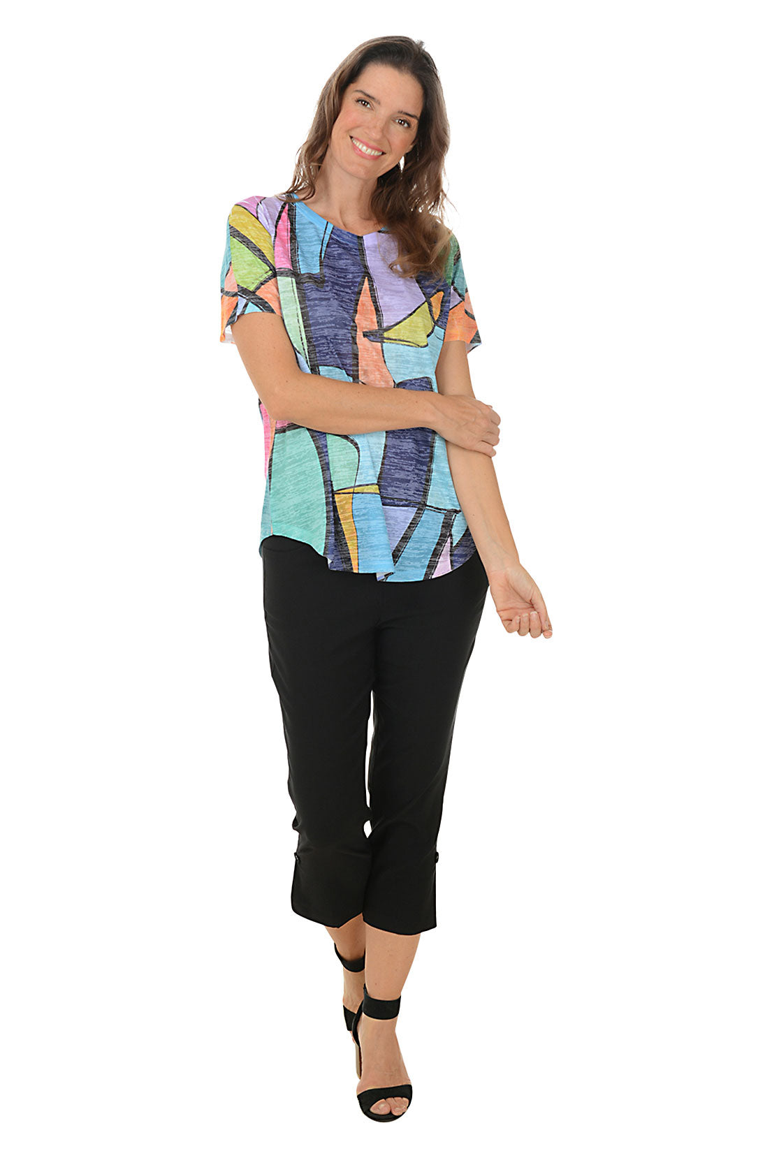 A model wearing black pull-on capri pants with a button hem detail, standing against a plain background. Second front shot.