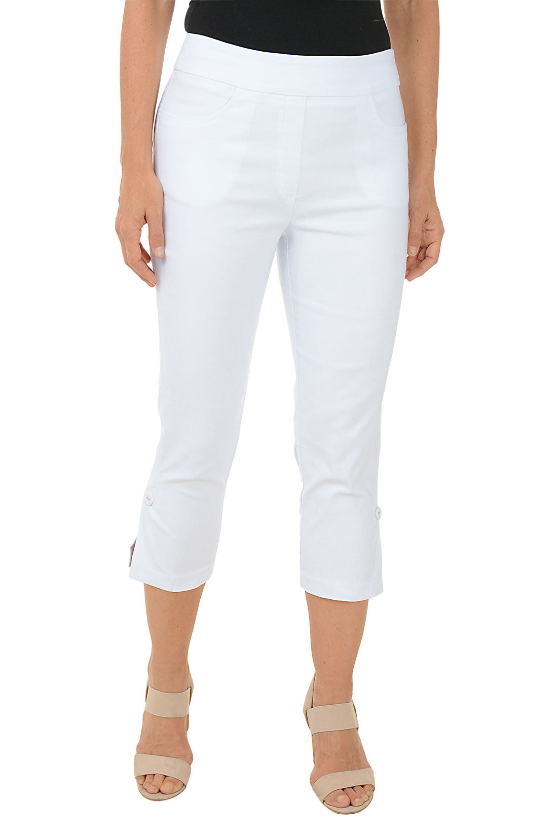 A model wearing white pull-on capri pants with a button hem detail, standing against a plain background.