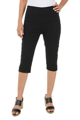 A pair of black petite zip hem pull-on clamdigger pants. The image shows the pants in a standing position with the front facing forward, displaying the elastic waistband, dual front pockets, and zippered detail on the hemline.