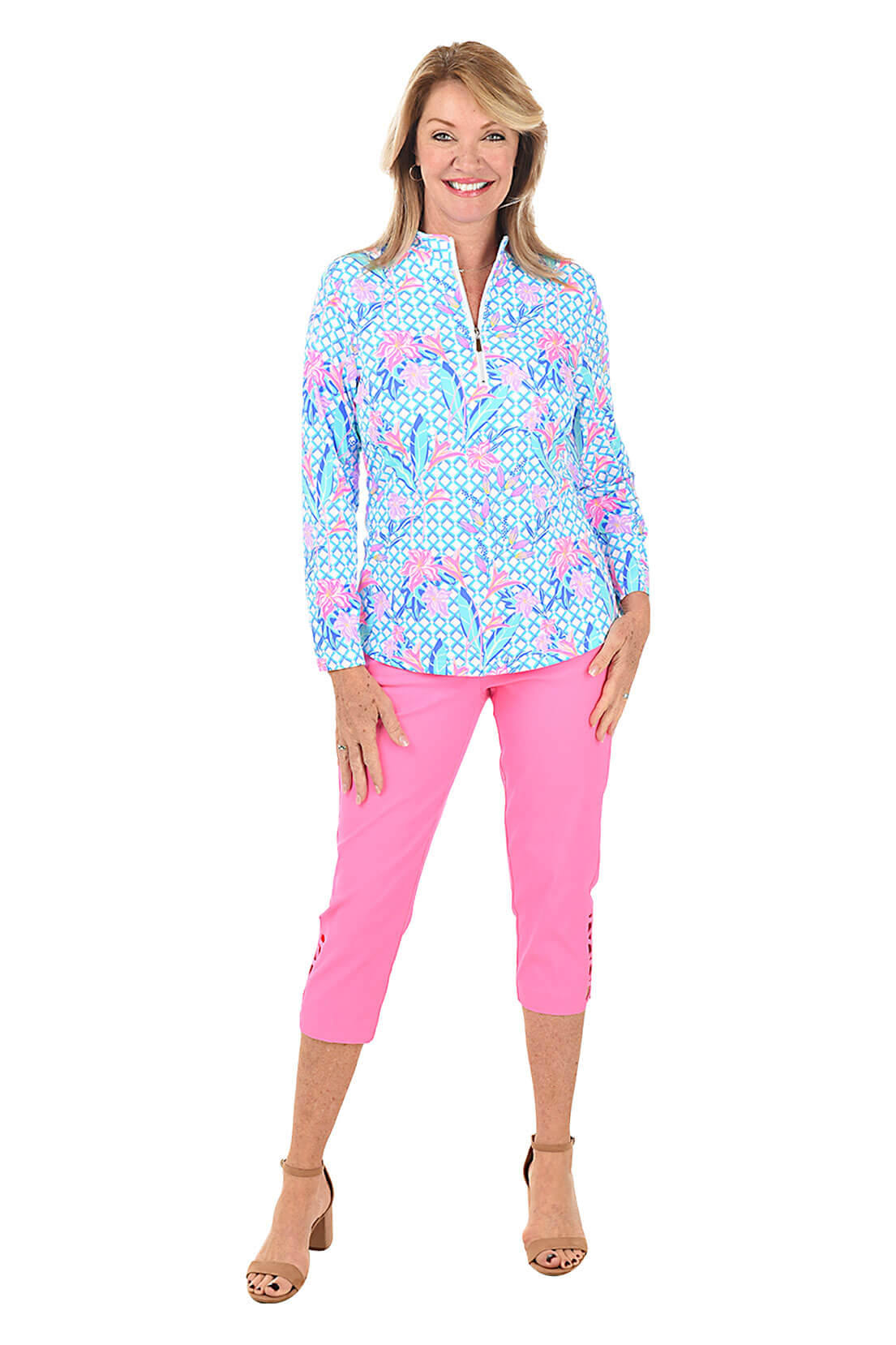 A pair of pink capri pants with lattice detail on the hemline, featuring front pockets and a flat back design. Full length shot.