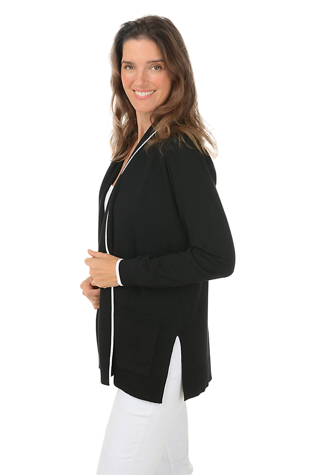 Woman wearing a black blazer over a white shirt on a white background
