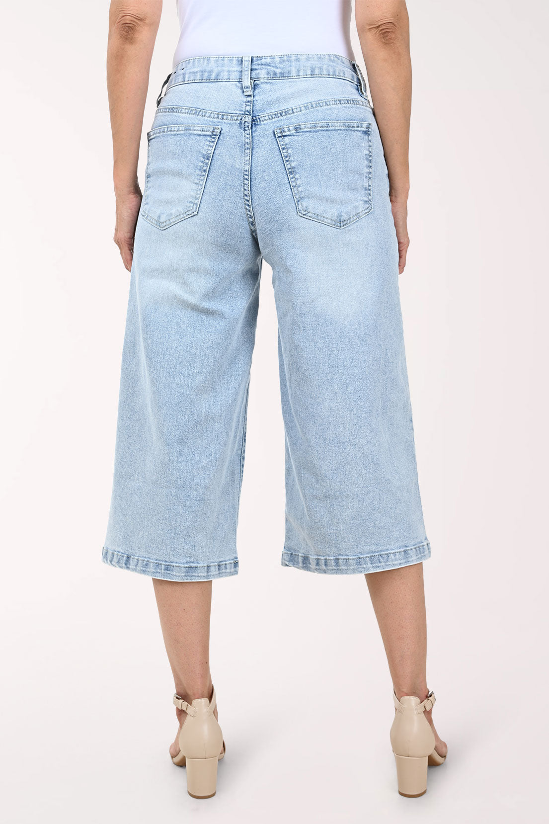Woman wearing cropped denim pants