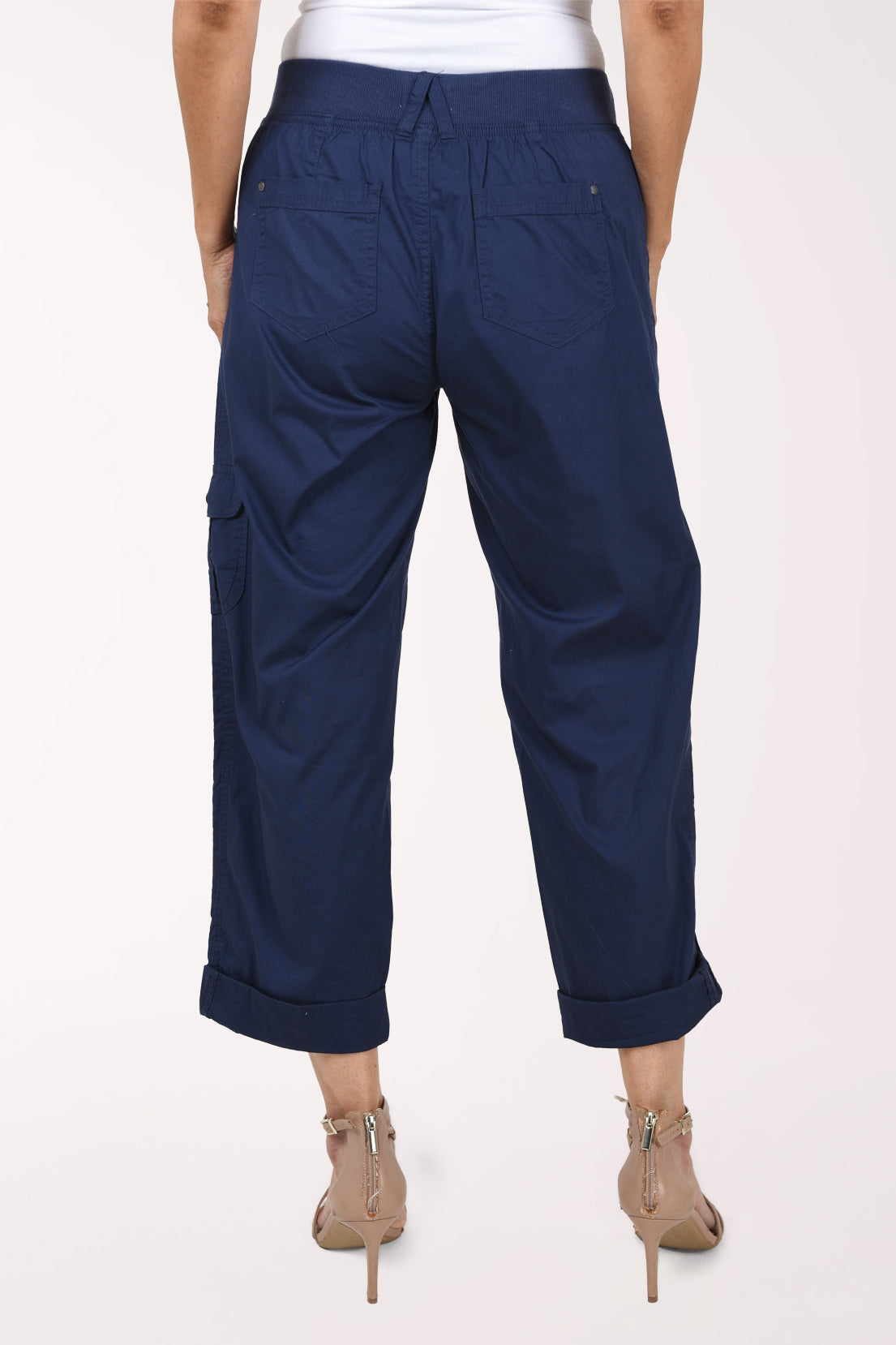 Woman wearing navy cropped pants