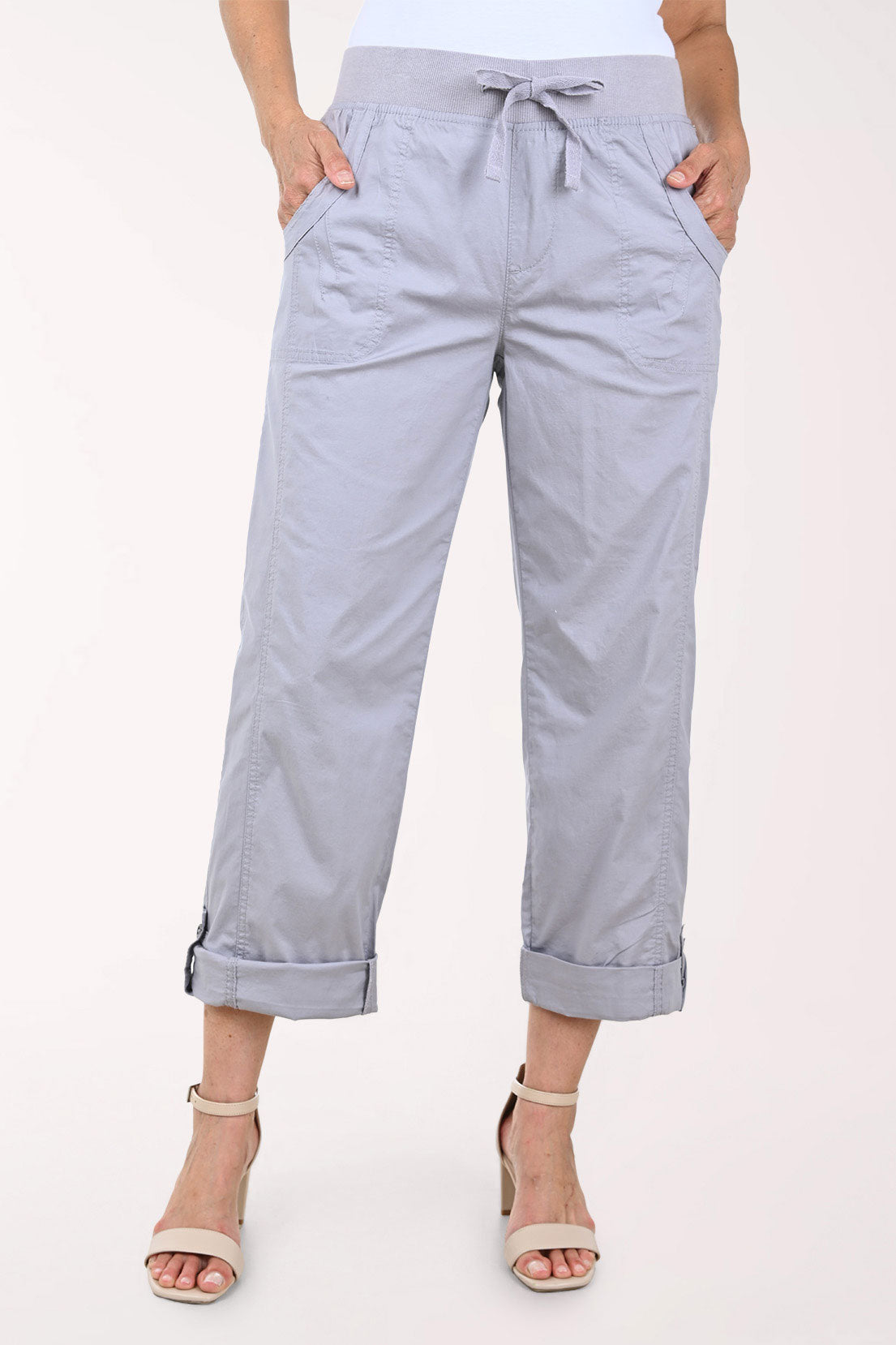 Woman wearing cropped grey pants