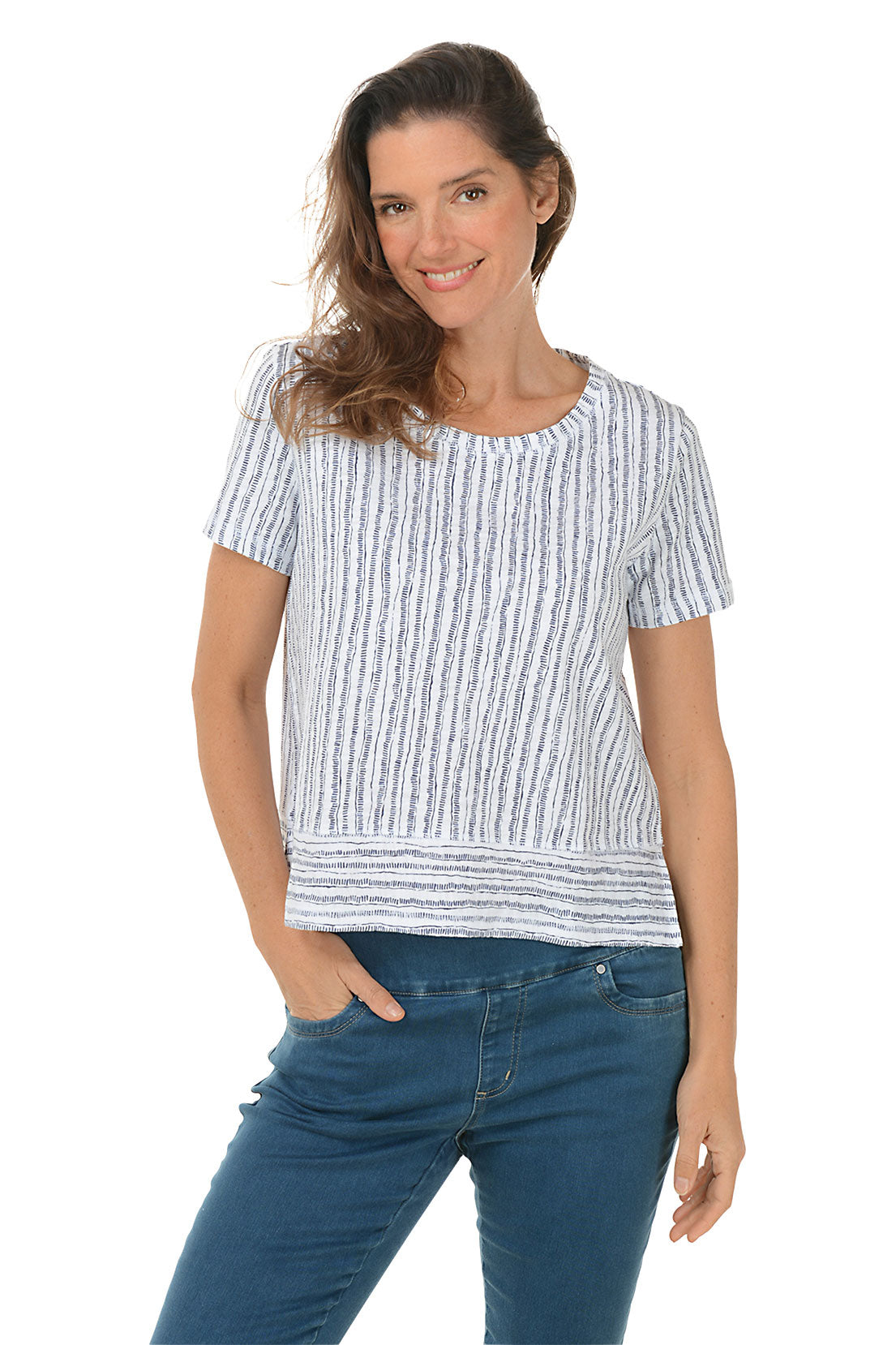 A woman wearing a striped high-low hemline t-shirt with a scoop neckline and short sleeves.