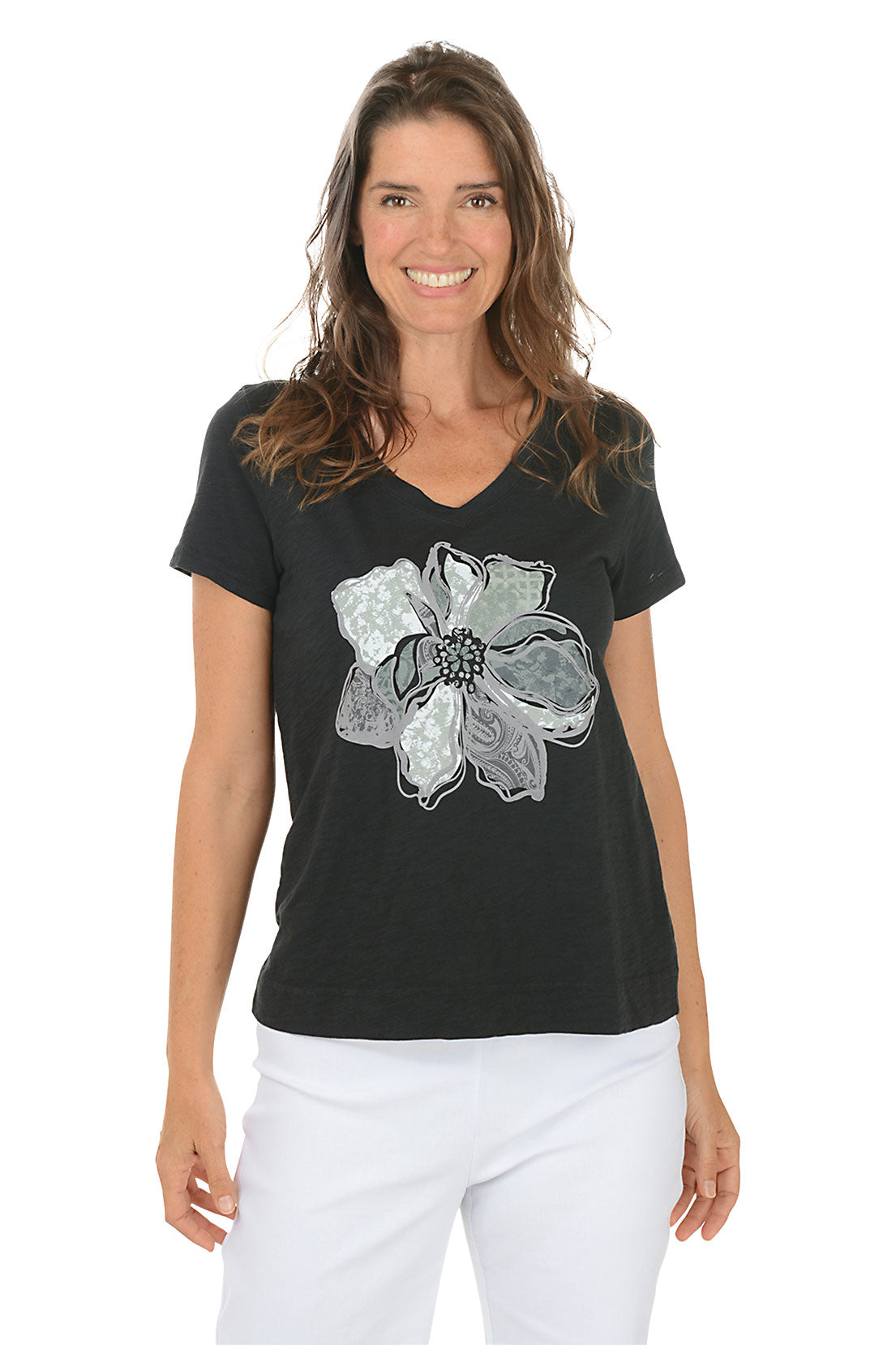 Woman wearing a black t-shirt with a floral design on a white background. Second front shot.