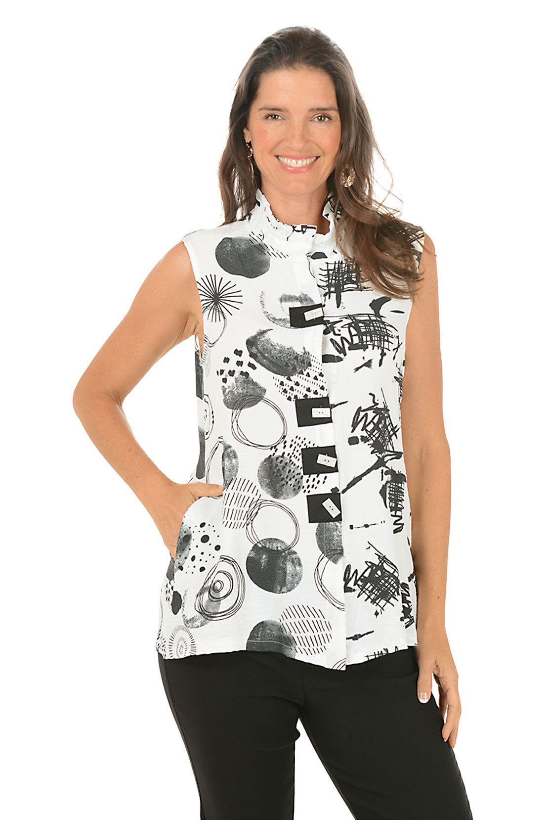 Woman wearing a sleeveless top with black and white abstract pattern on a white background.