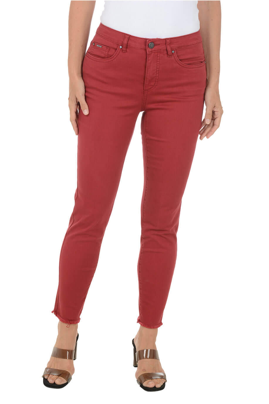 Red jeans worn by a person on a white background