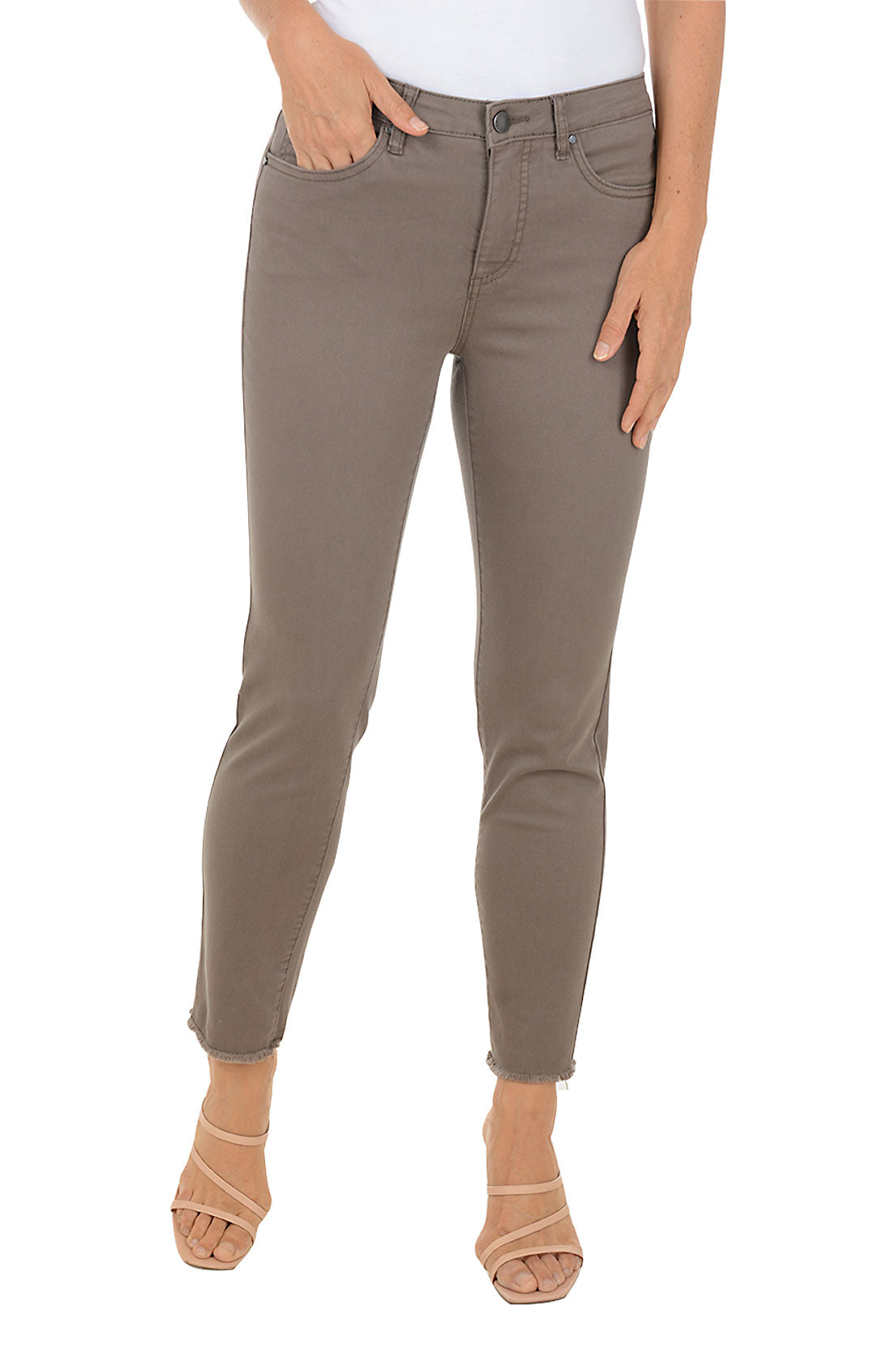 Person wearing grey pants on a white background