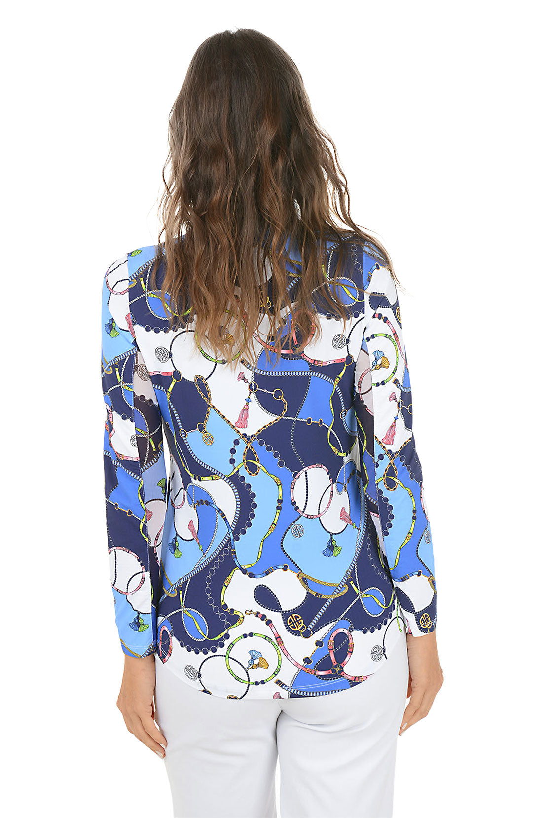 Woman wearing a colorful patterned blouse with a white background. Back shot.