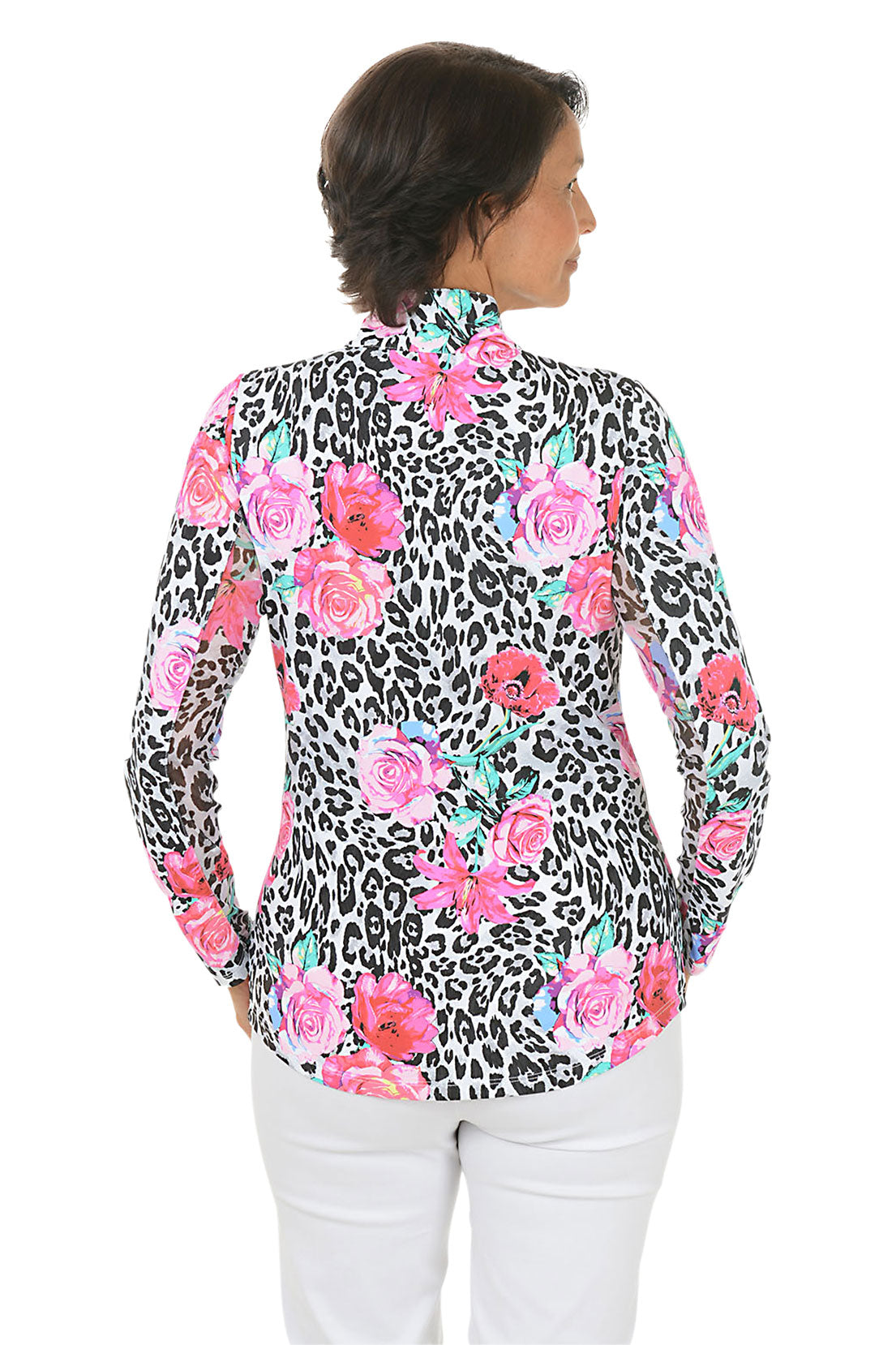 Woman wearing a long-sleeve top with floral and leopard print pattern on a white background. Back shot.