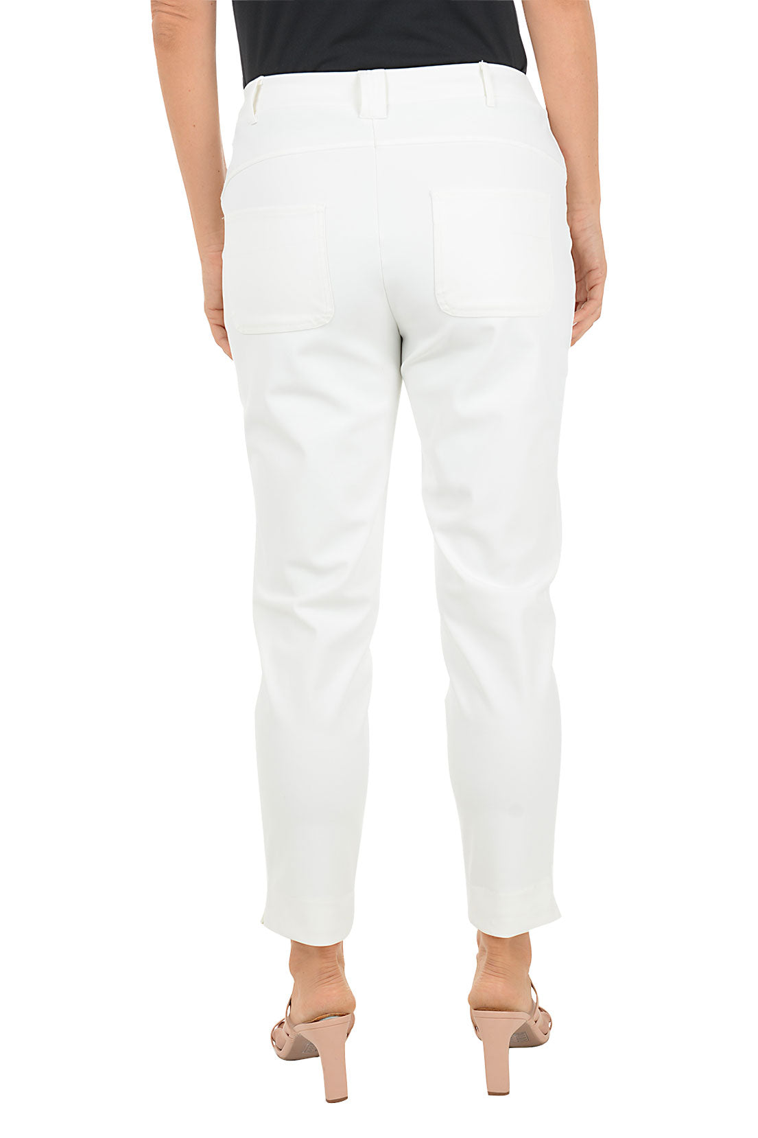 White pants worn by a person on a white background. Back shot.