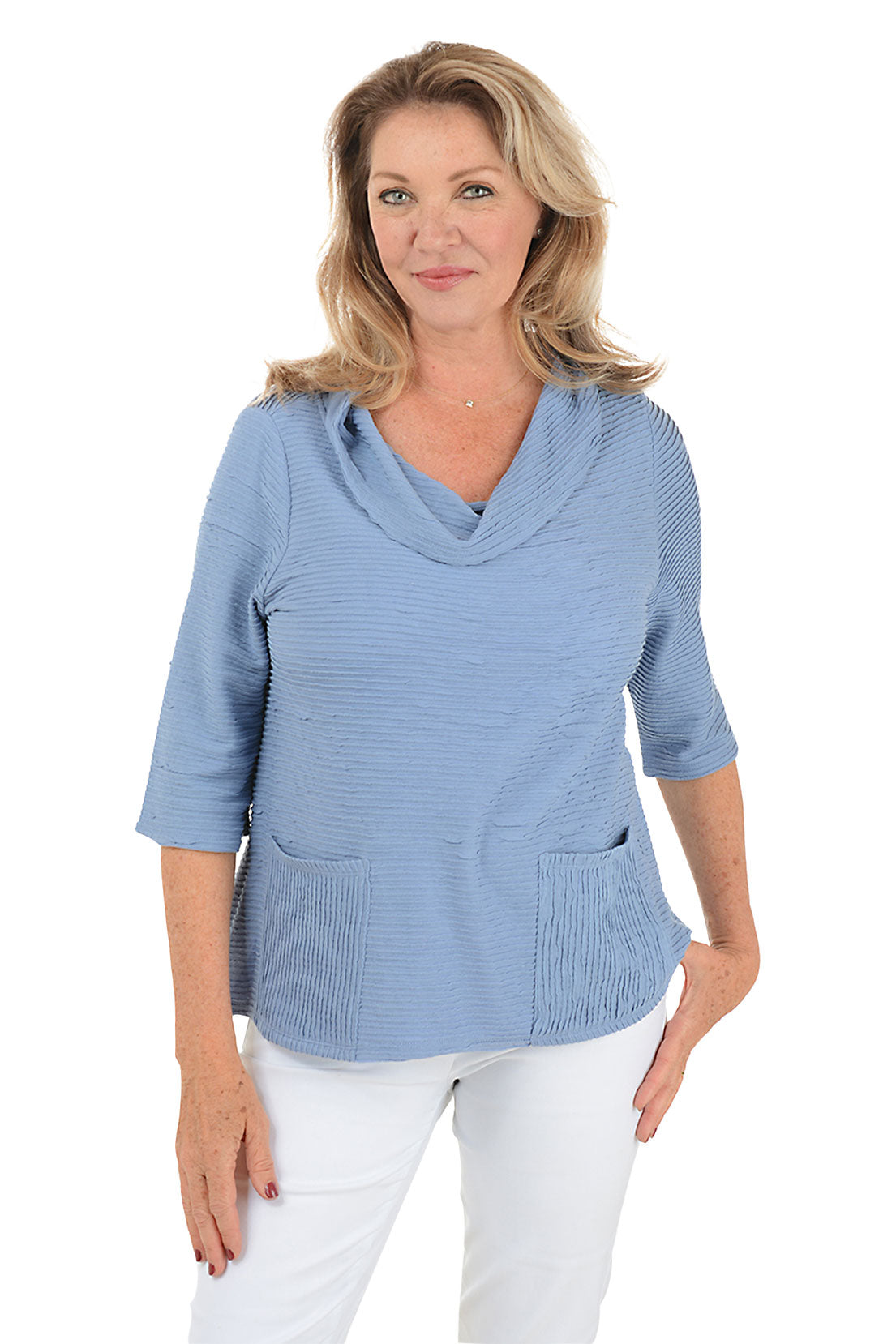 A front shot of a model wearing a rain ribbed double pocket top with 3/4 sleeves and a cowl neckline.