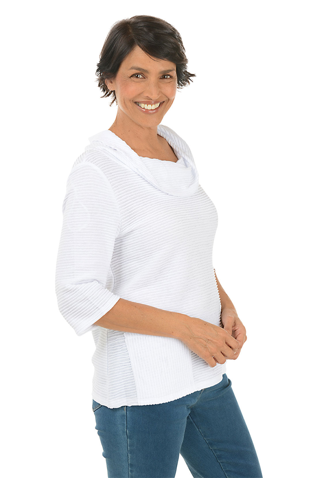 A side shot of a model wearing a white ribbed double pocket top with 3/4 sleeves and a cowl neckline.