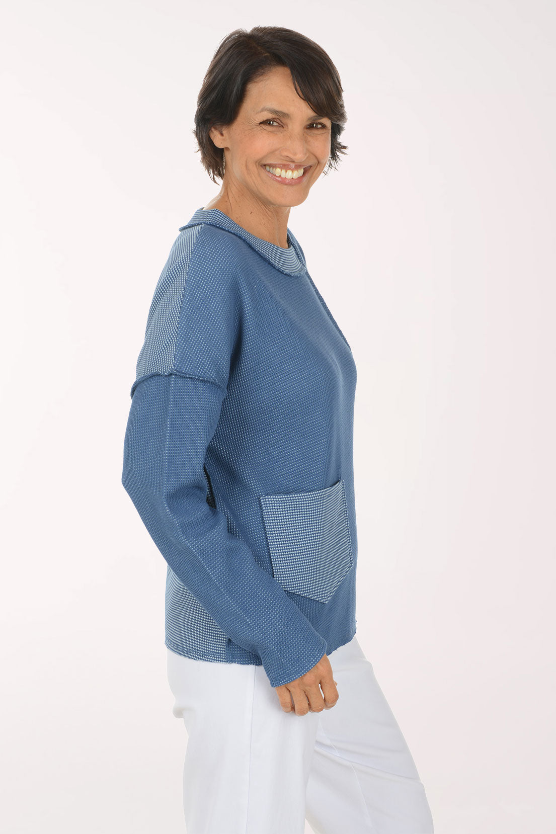 Woman wearing a blue sweater
